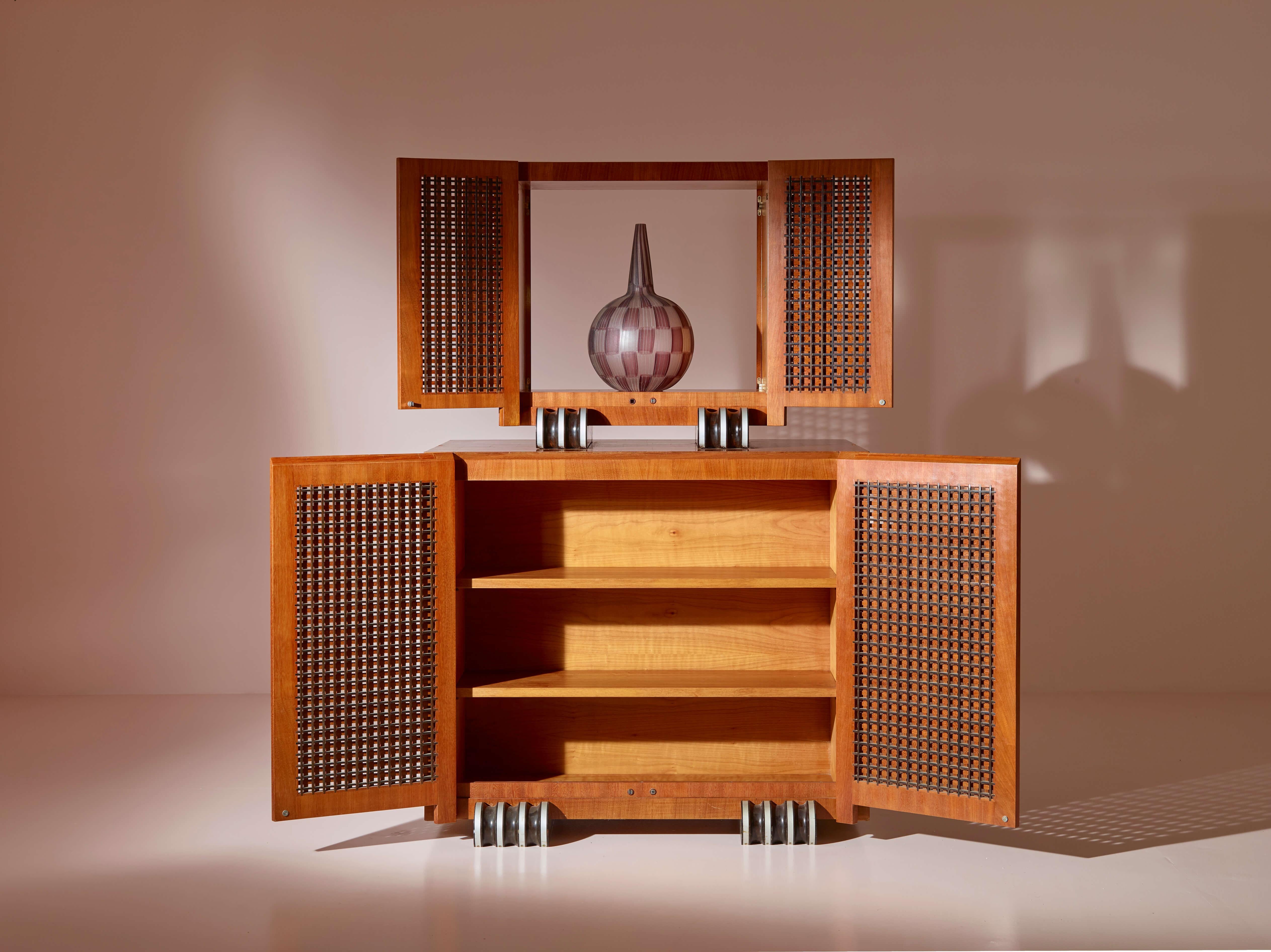 Ebony A two-part cabinet in rare exotic woods with solid ebony inlays, Italy, 1990s For Sale