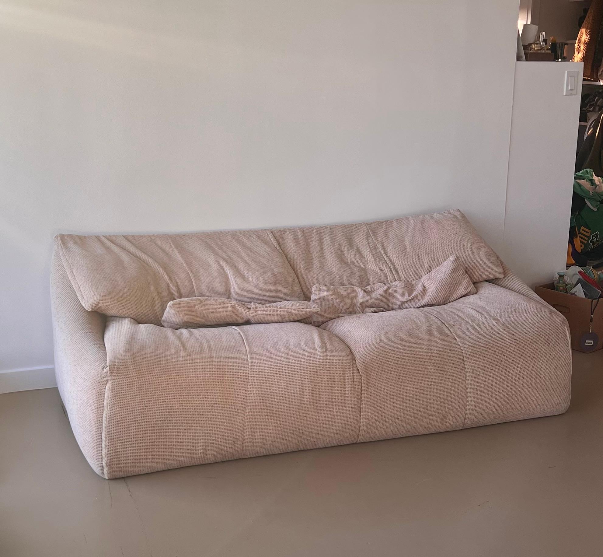 A two-seater “Plumy” sofa by Annie Hiéronimus for Cinna, France circa 1970s. Cinna was an offshoot of Ligne Roset, established in 1975, that featured myriad works by Annie Hiéronimus and other forward-thinking designers. The Plumy sofa was one such