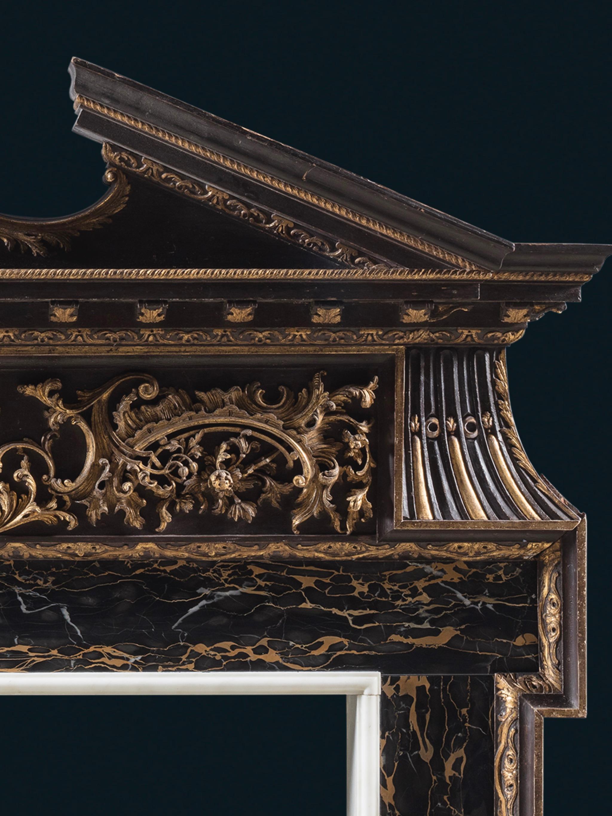 English A Unique 18th Century Palladian Chimneypiece in Parcel-Gilt and Portoro Nero For Sale