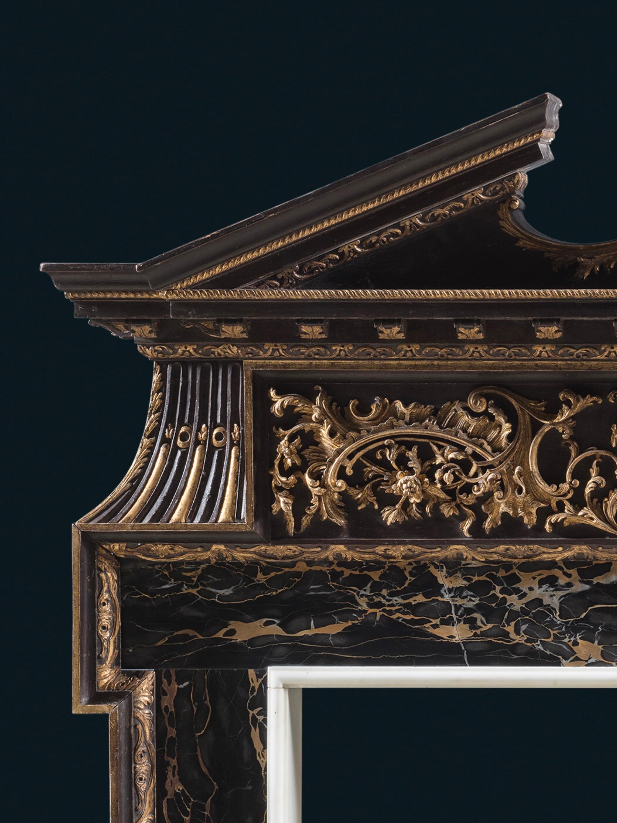 A Unique 18th Century Palladian Chimneypiece in Parcel-Gilt and Portoro Nero In Good Condition For Sale In London, GB