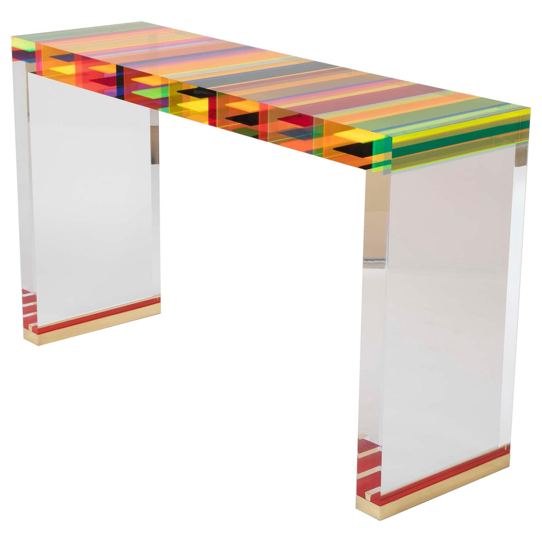 A Unique Contemporary Clear Lucite and Striped Console Table With Brass Feet