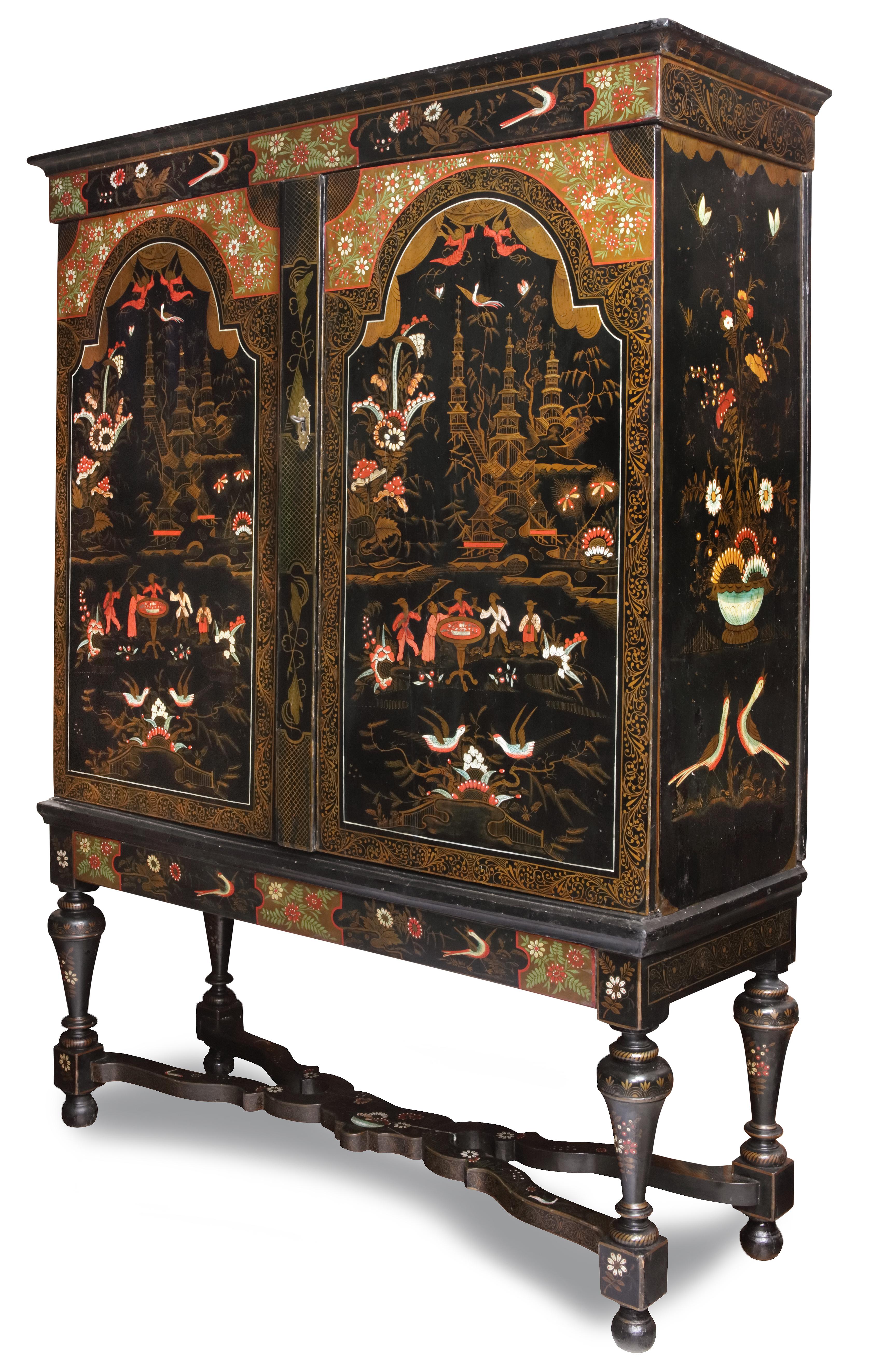 An important and unique Dutch polychrome lacquered chinoiserie cabinet on stand

Holland or West-Friesland, circa 1700

The pine-wood cabinet japanned in black, gold, green, red, blue and white on a black ground, on four legs with stretcher, the
