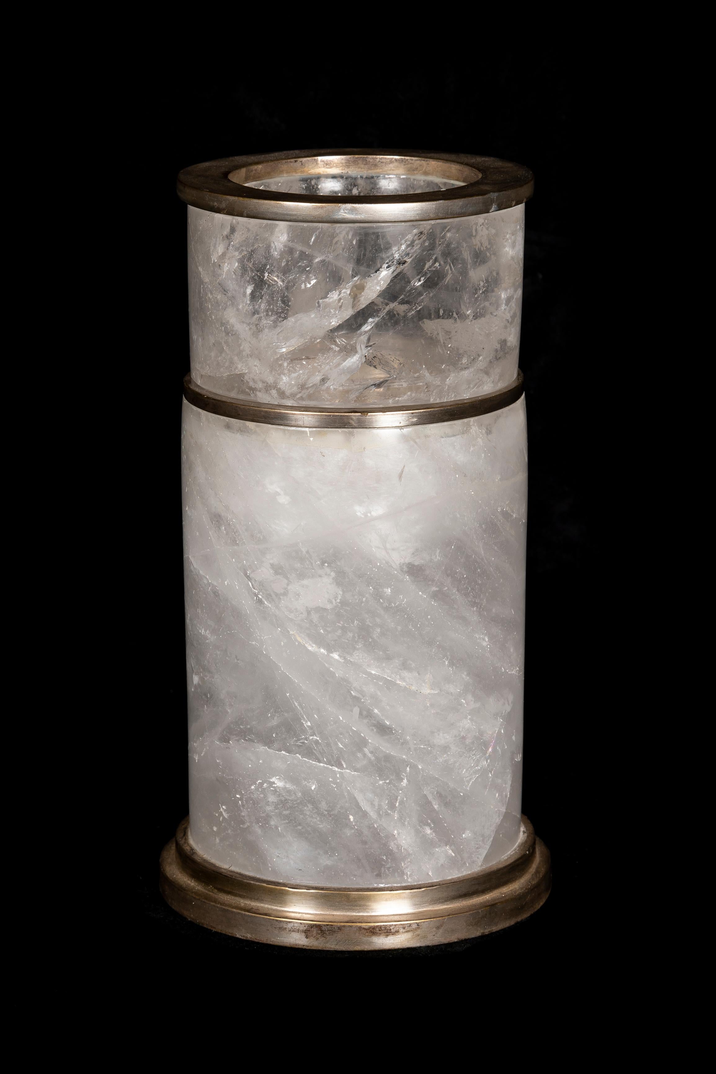A Unique French Art Deco Style Silvered Bronze mounted cut rock crystal two part circular form candlestick of superb quality. This unique thick and heavy rock crystal candlestick is made of two separate round cut rock crystal pieces and mounted in