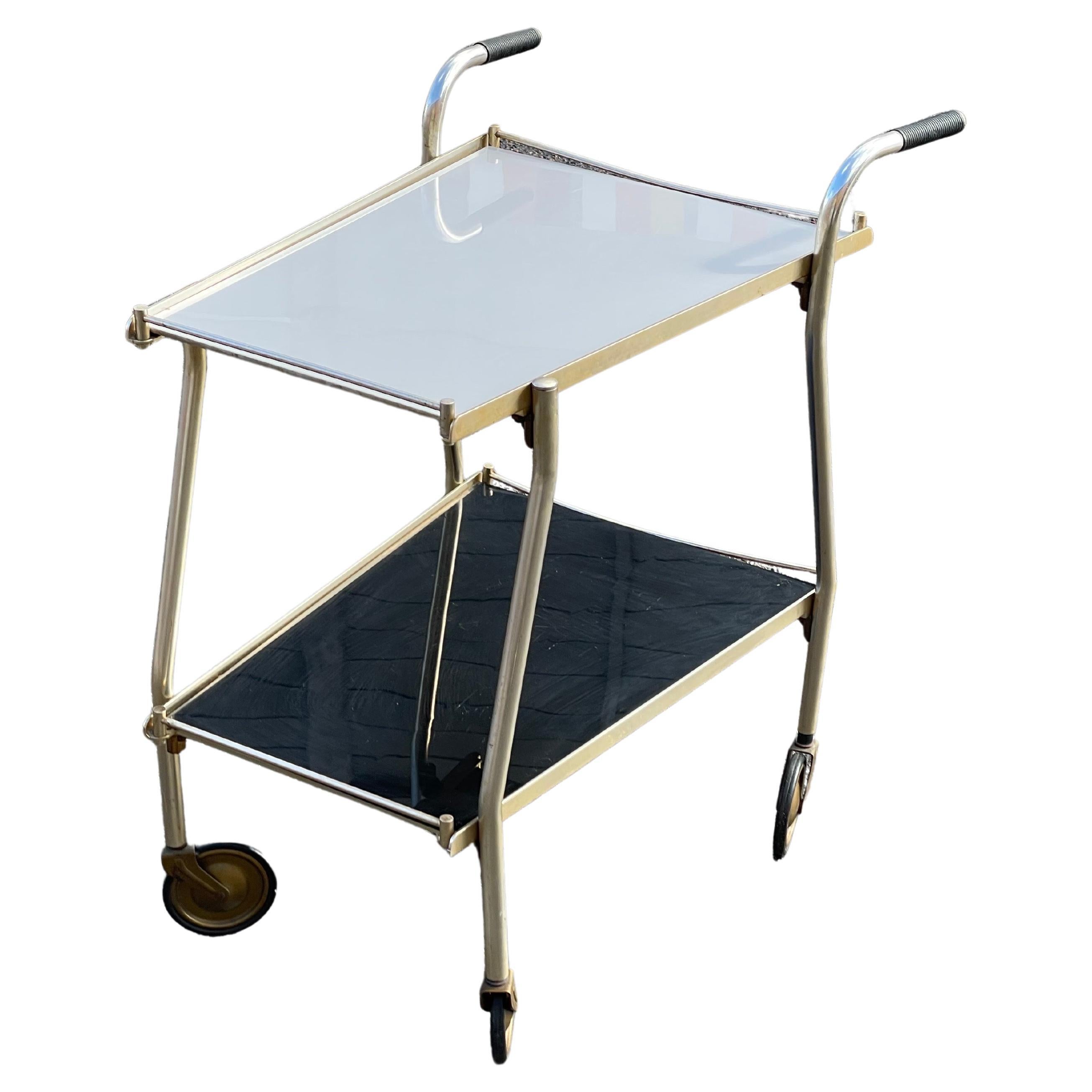 Unique Golden Vintage Bar Cart with Black and White Glass Shelves, 1960s For Sale