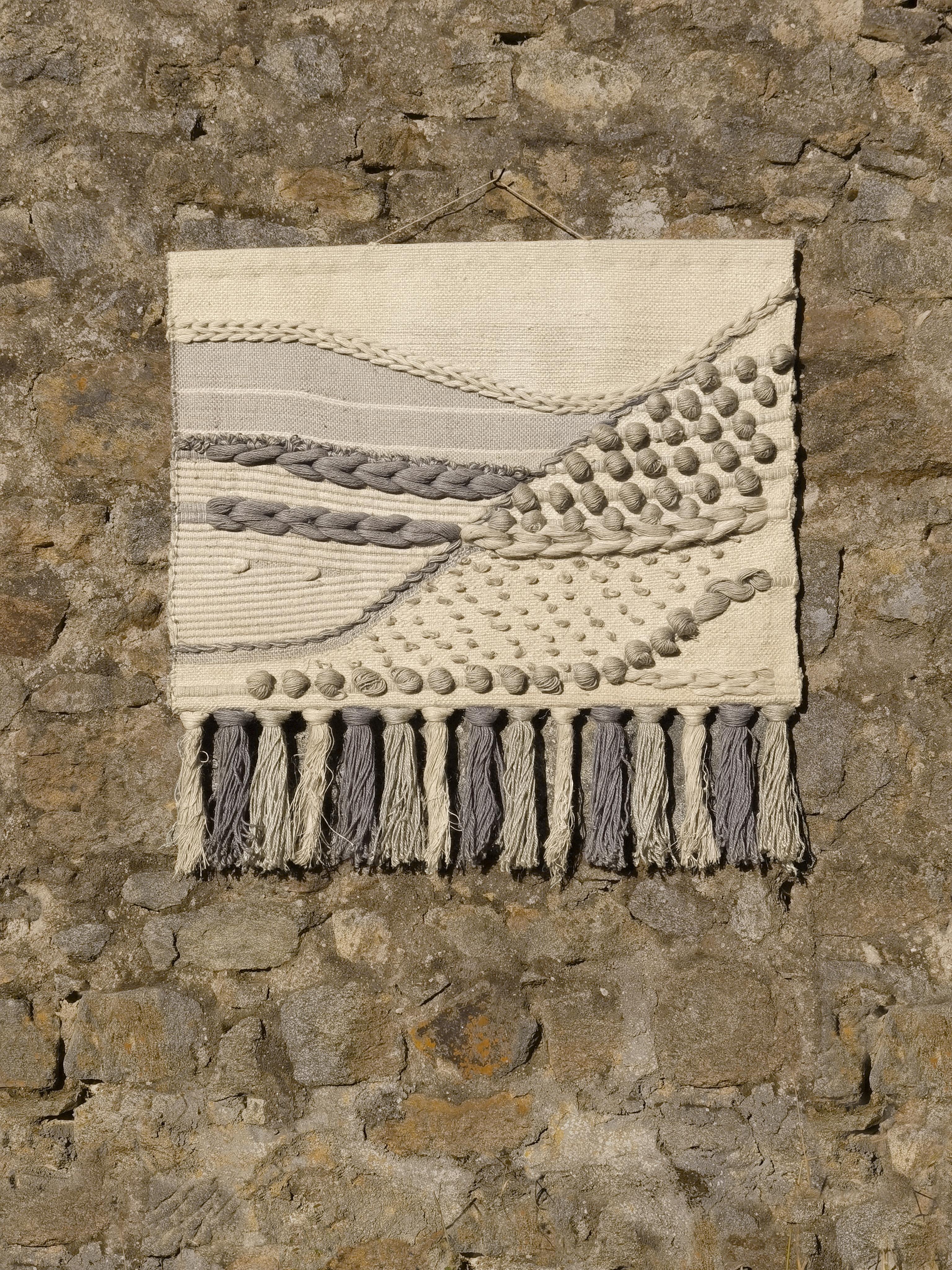 An exceptional handmade abstract modern tapestry, Modernist, Forme-Libre, Lyrical Abstraction, Hippie, made in thick wool hand woven forming beautiful and sensual patterns and reliefs, unsigned, to be attributed, Aubusson, France, 1950.