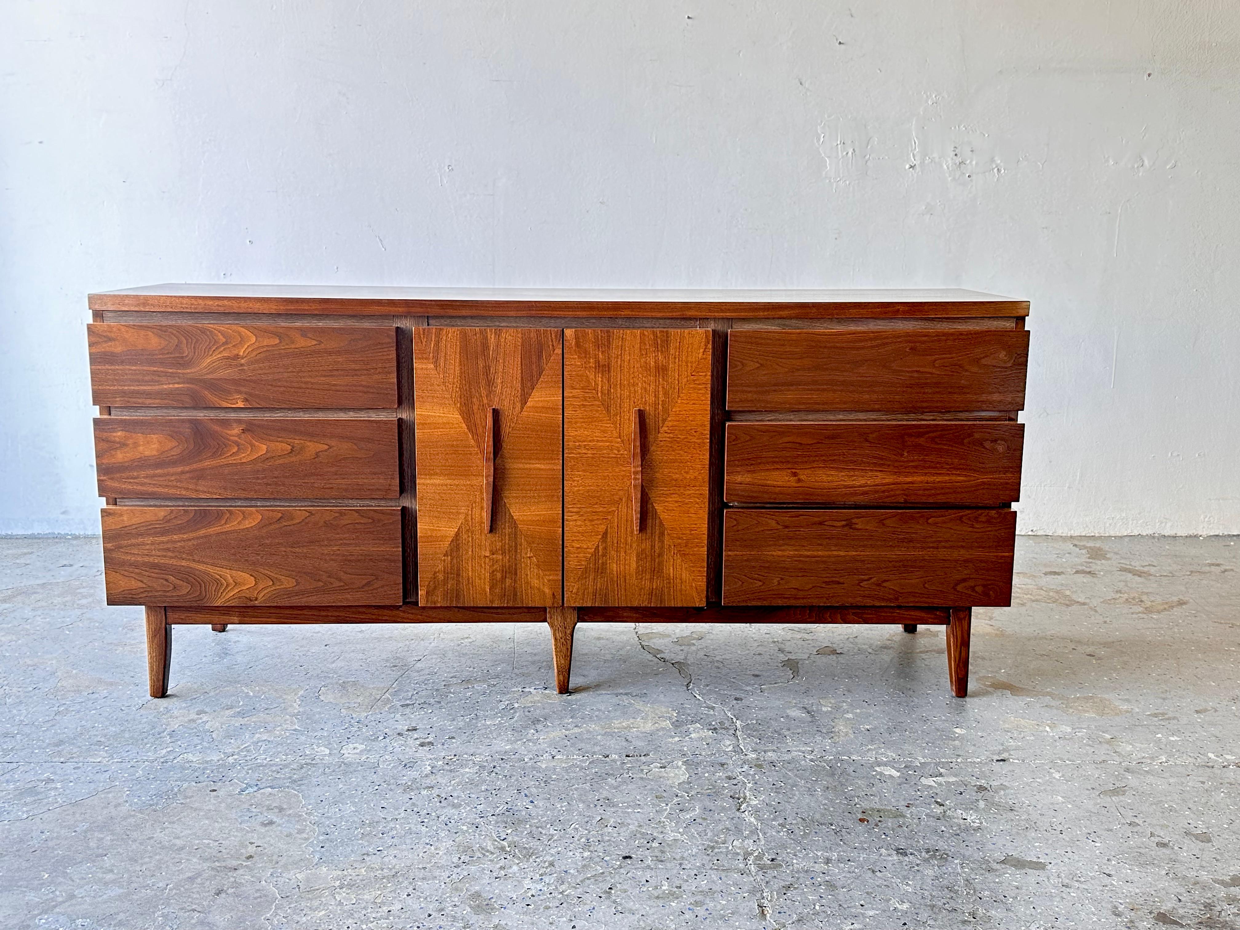 A Unique Long Mid Century Modern Walnut Credenza For Sale at 1stDibs