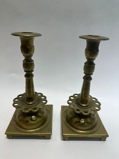 A Unique Pair of 18th-Century Polish Brass Candle Holders