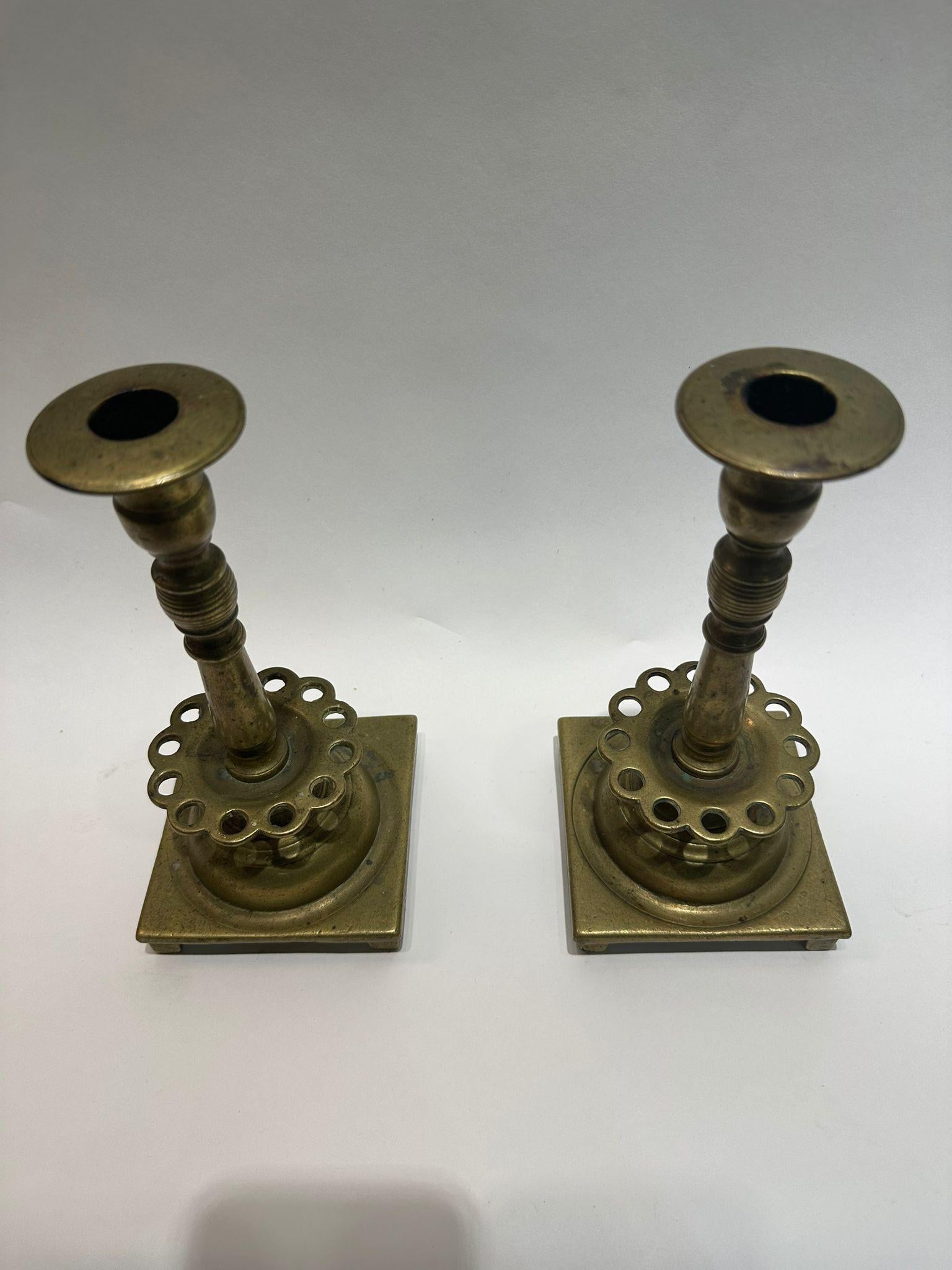 Primitive A Unique Pair of 18th-Century Polish Brass Candle Holders For Sale