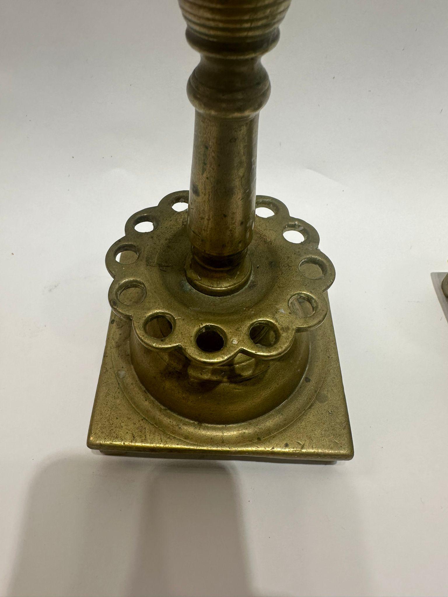 A Unique Pair of 18th-Century Polish Brass Candle Holders For Sale 3