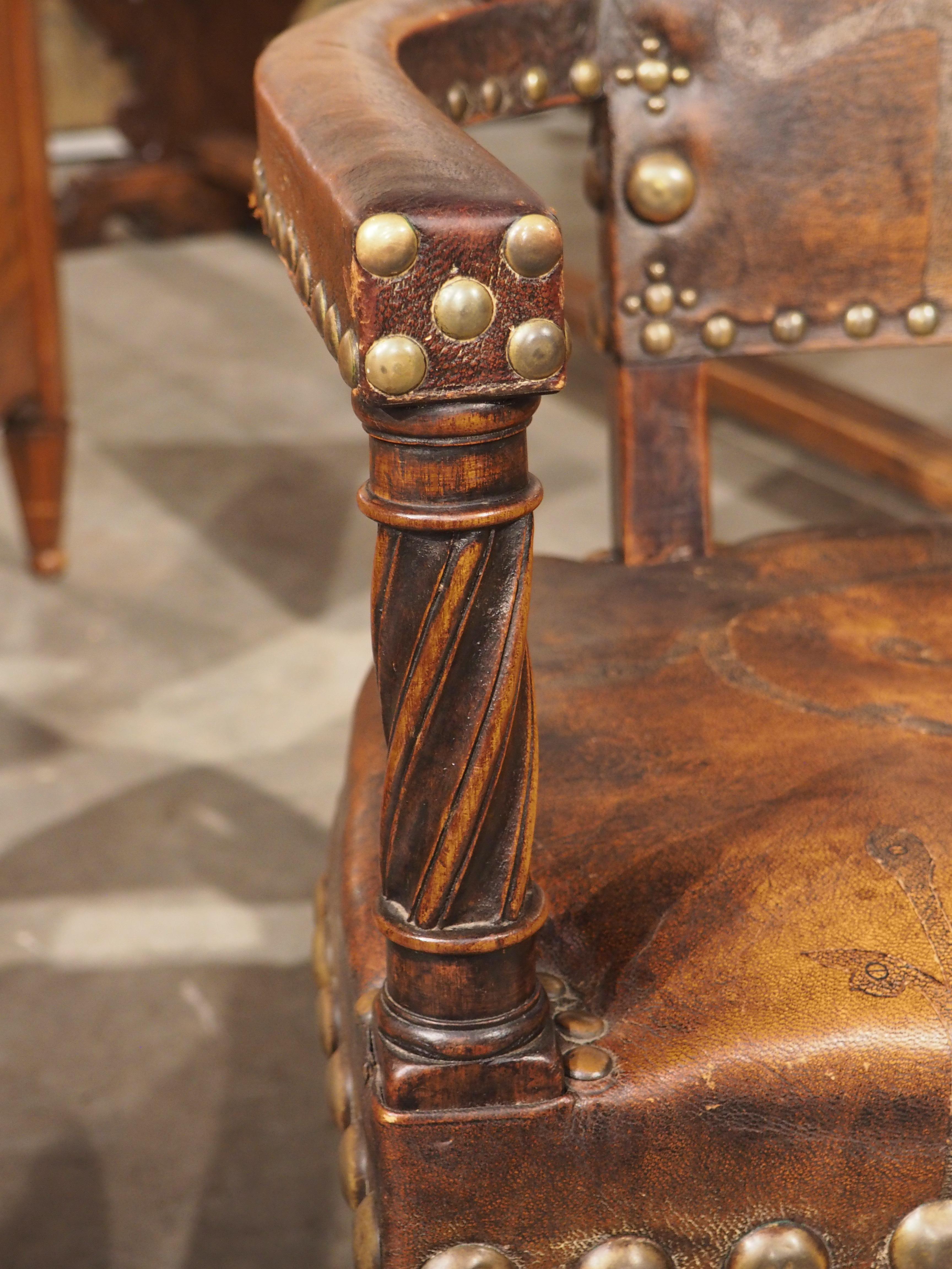 A Unique Pair of 19th Century Studded Leather Armchairs from Spain 4