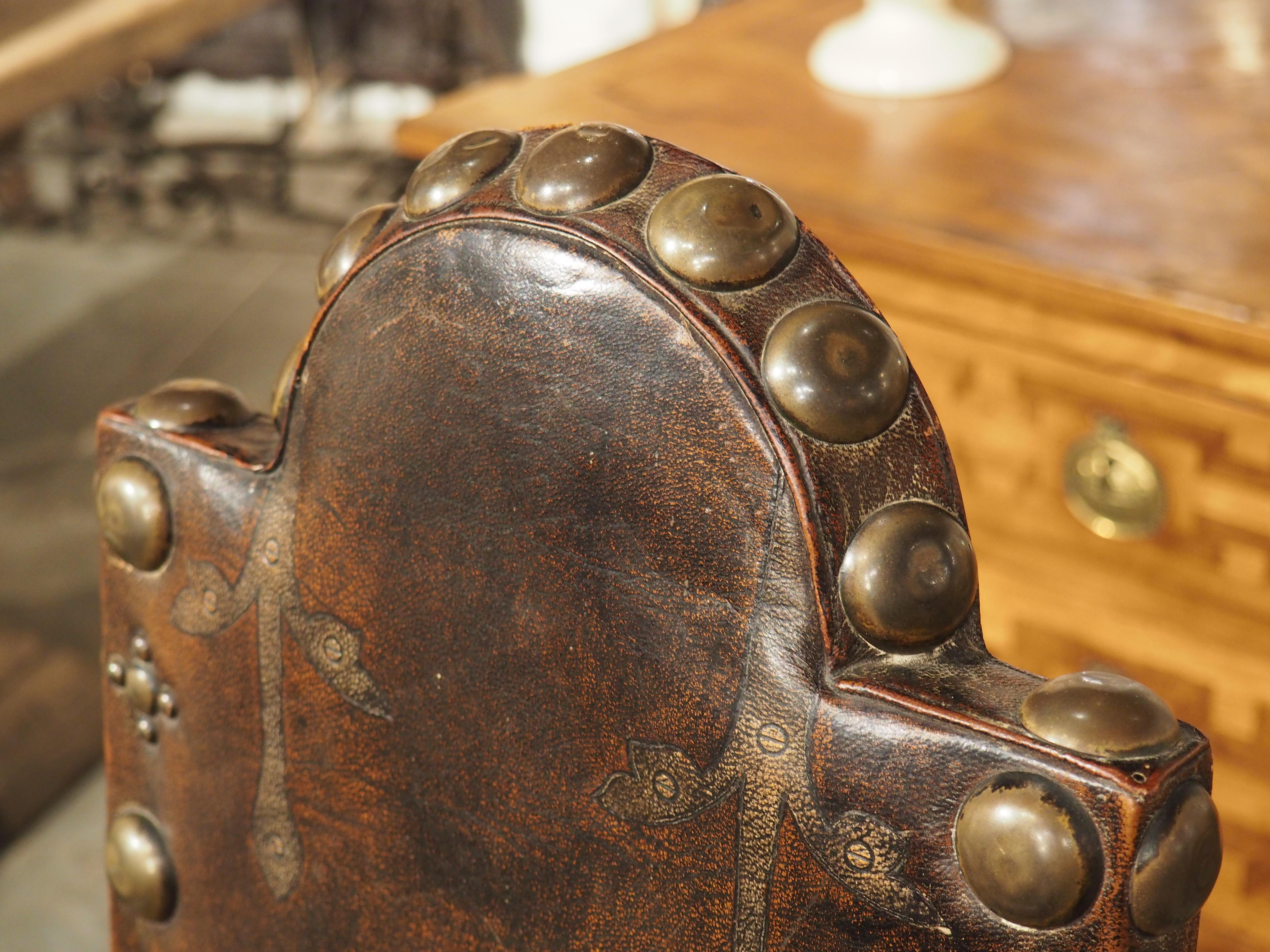 A Unique Pair of 19th Century Studded Leather Armchairs from Spain 6