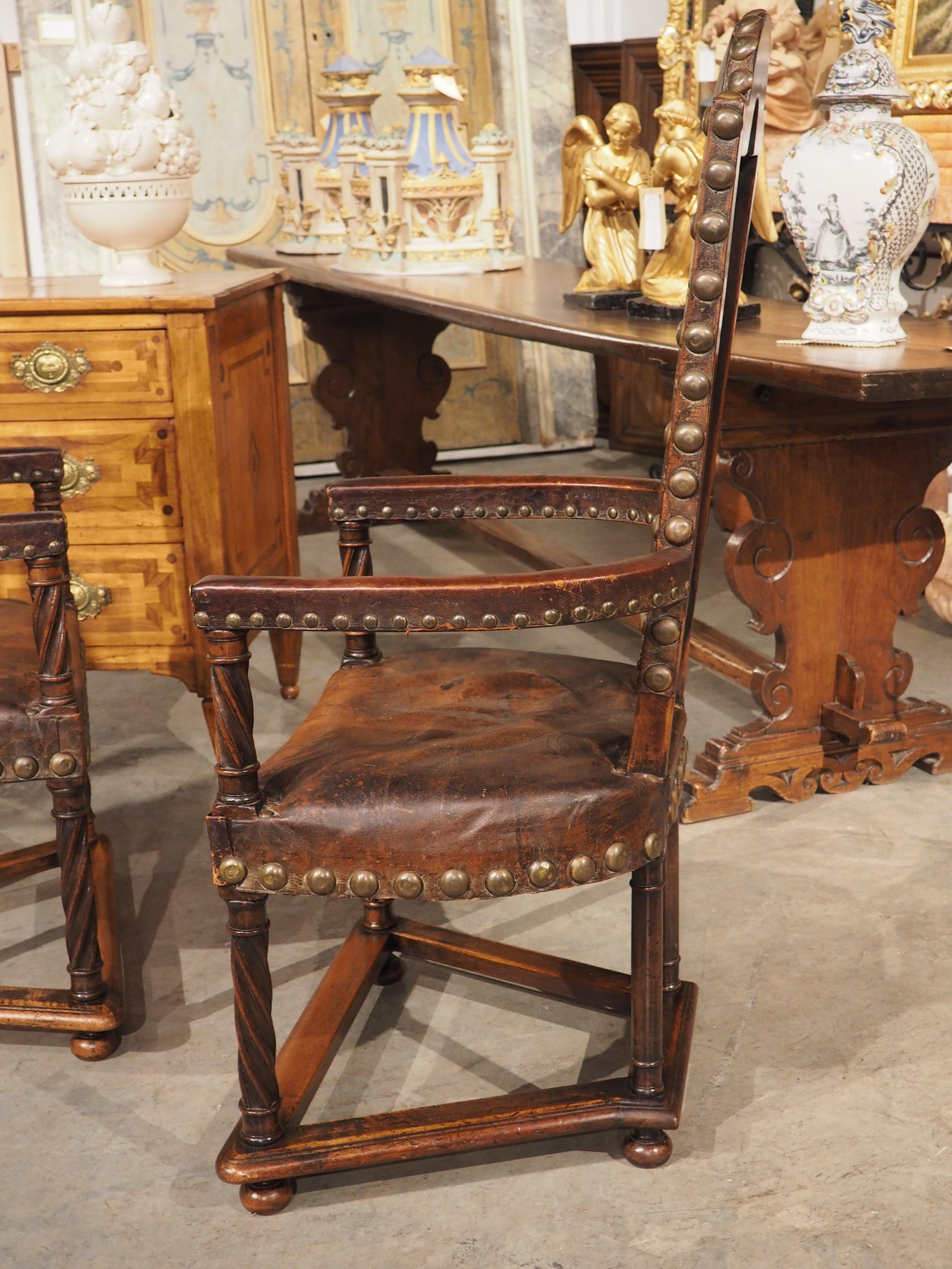 A Unique Pair of 19th Century Studded Leather Armchairs from Spain 12