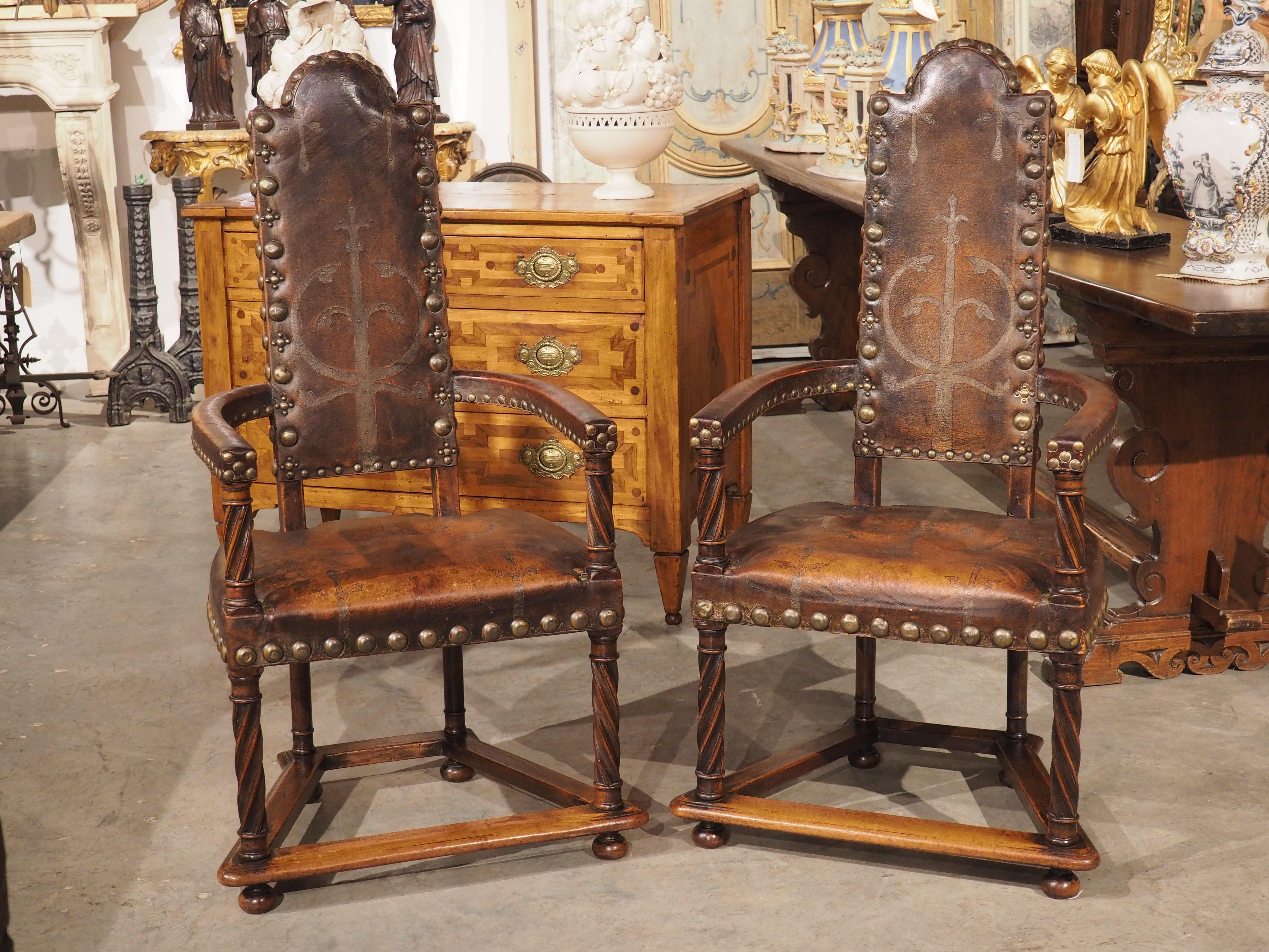 Spanish A Unique Pair of 19th Century Studded Leather Armchairs from Spain