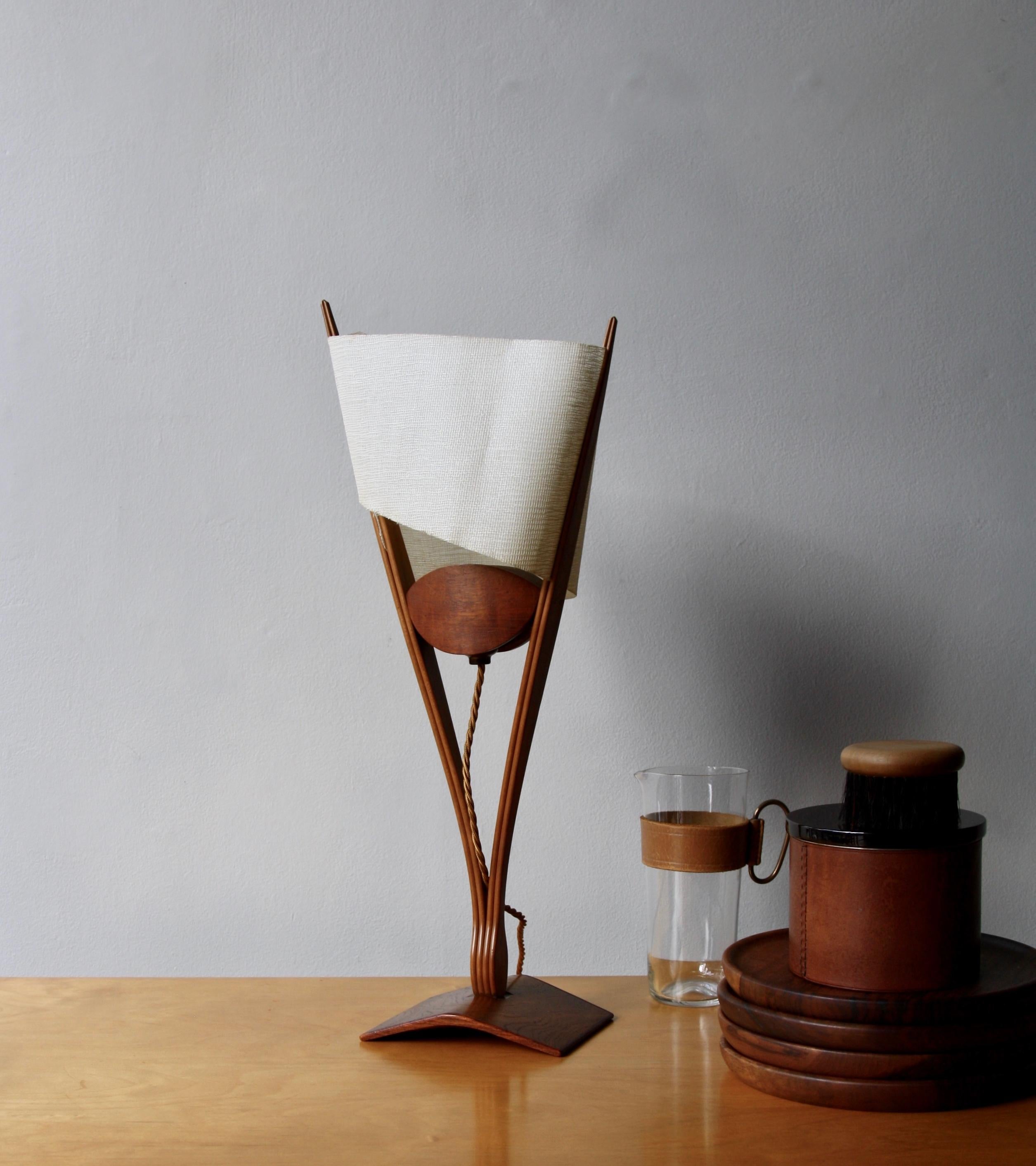 A unique, presumed prototype, table light designed and made by David Pye, England, circa 1941. Pye practised as an architect, specialising in wooden buildings, on leaving the AA. However, his main career was in teaching. Pye spent twenty six years
