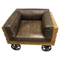 A Unique Set of 4 Wood Framed Industrial Club Chairs The chairs are Solid Wood