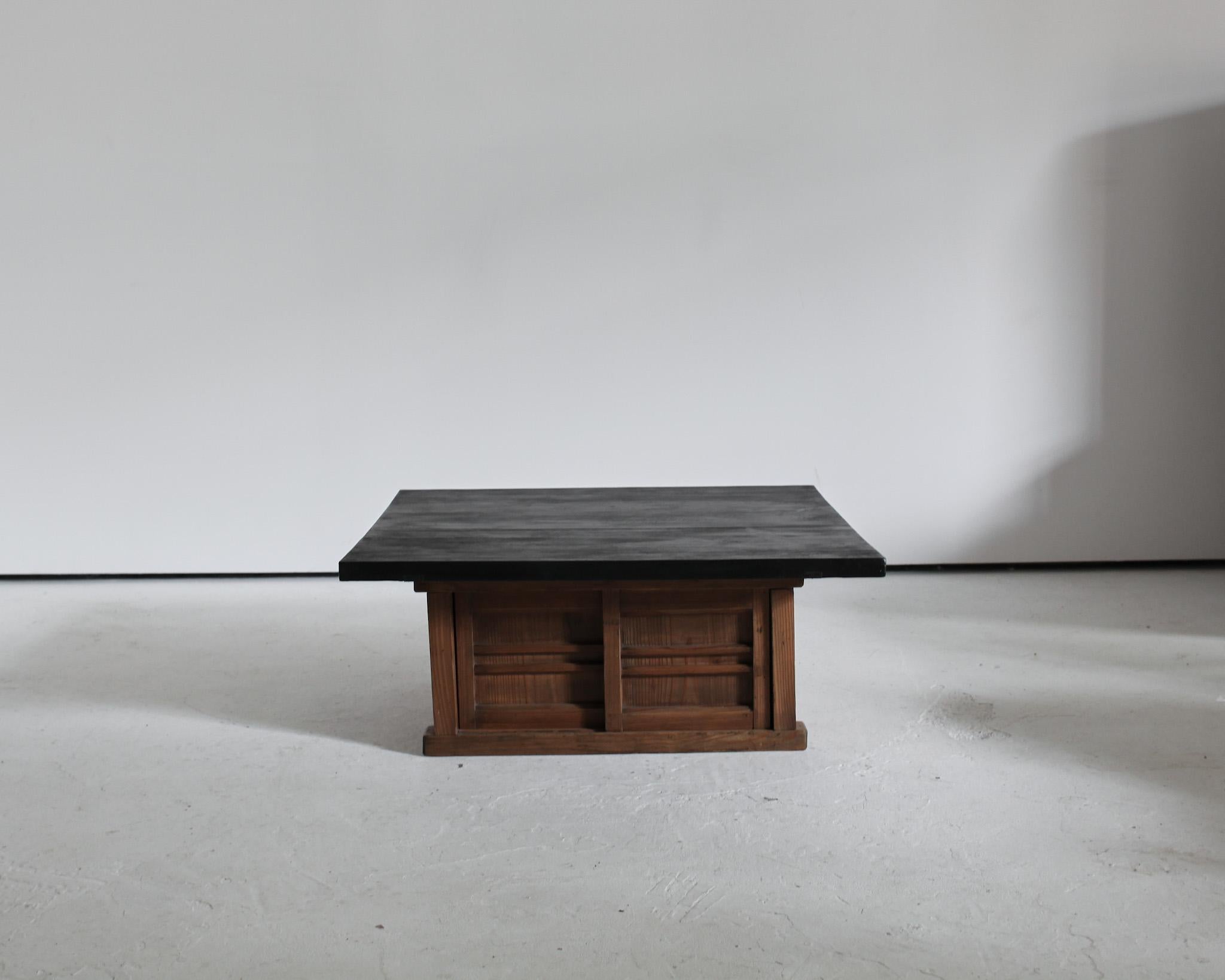 Charred cedar top on late 19th century. Two door cedar tansu base.
Good strong design with ample storage.
Made using 19th century. Japanese elements in our London workshop.
