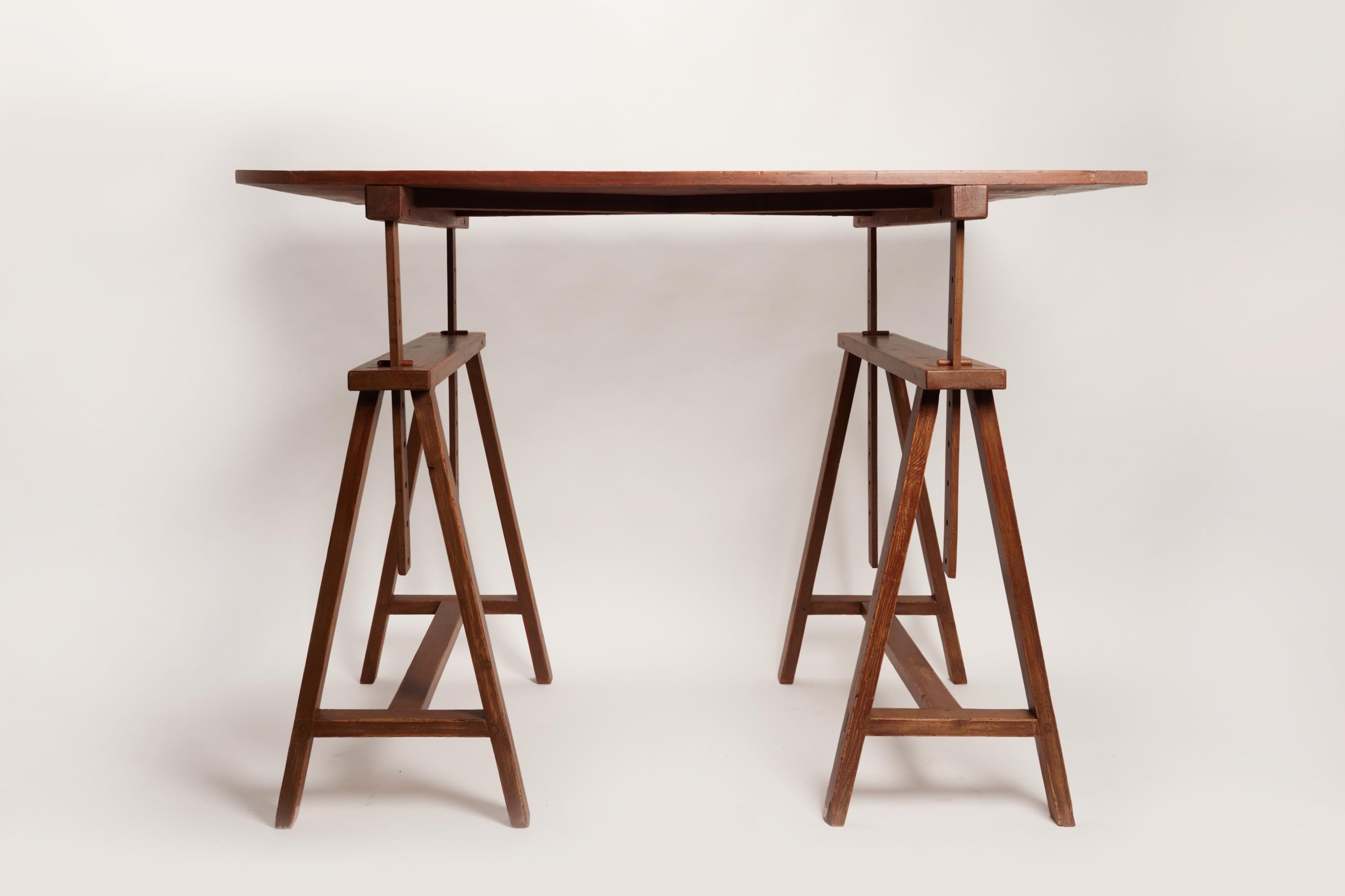 Unusual early XX Century Italian wooden drafting machine trestle table. The board can be liftable and reclining. Italy 1900 ca.