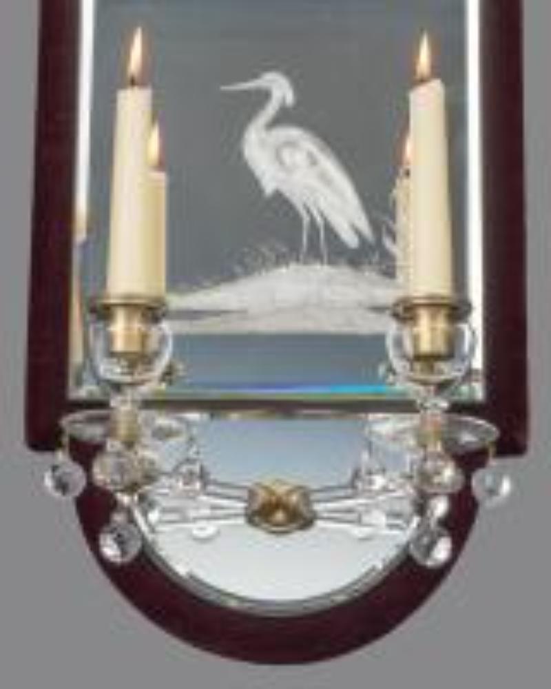 The mirror sections are finely engraved with butterflies and fishing herons, the lower domed panel issuing plain candle arms supporting drop hung drip pans and candle nozzles, The mirror sections are imbedded ruby velvet borders.

England, circa
