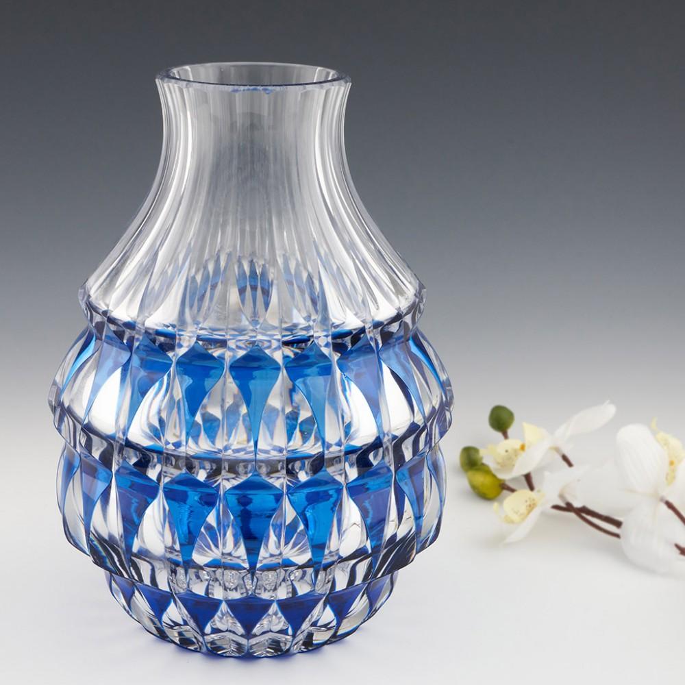 A Val Saint Lambert Cut Crystal Vase, 1935 - 1950

Additional information: 
Date : 1935 to1950
Origin : Seraing, Belgium
Colour : Cased royal blue
Pontil : Polished
Glass Type : Lead
Size :  W 8.8 x H 26.5 cm, 18.5 cm max diameter
Condition : Some