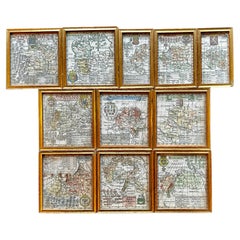 Une variété de onze merveilleuses cartes anciennes, encadrées