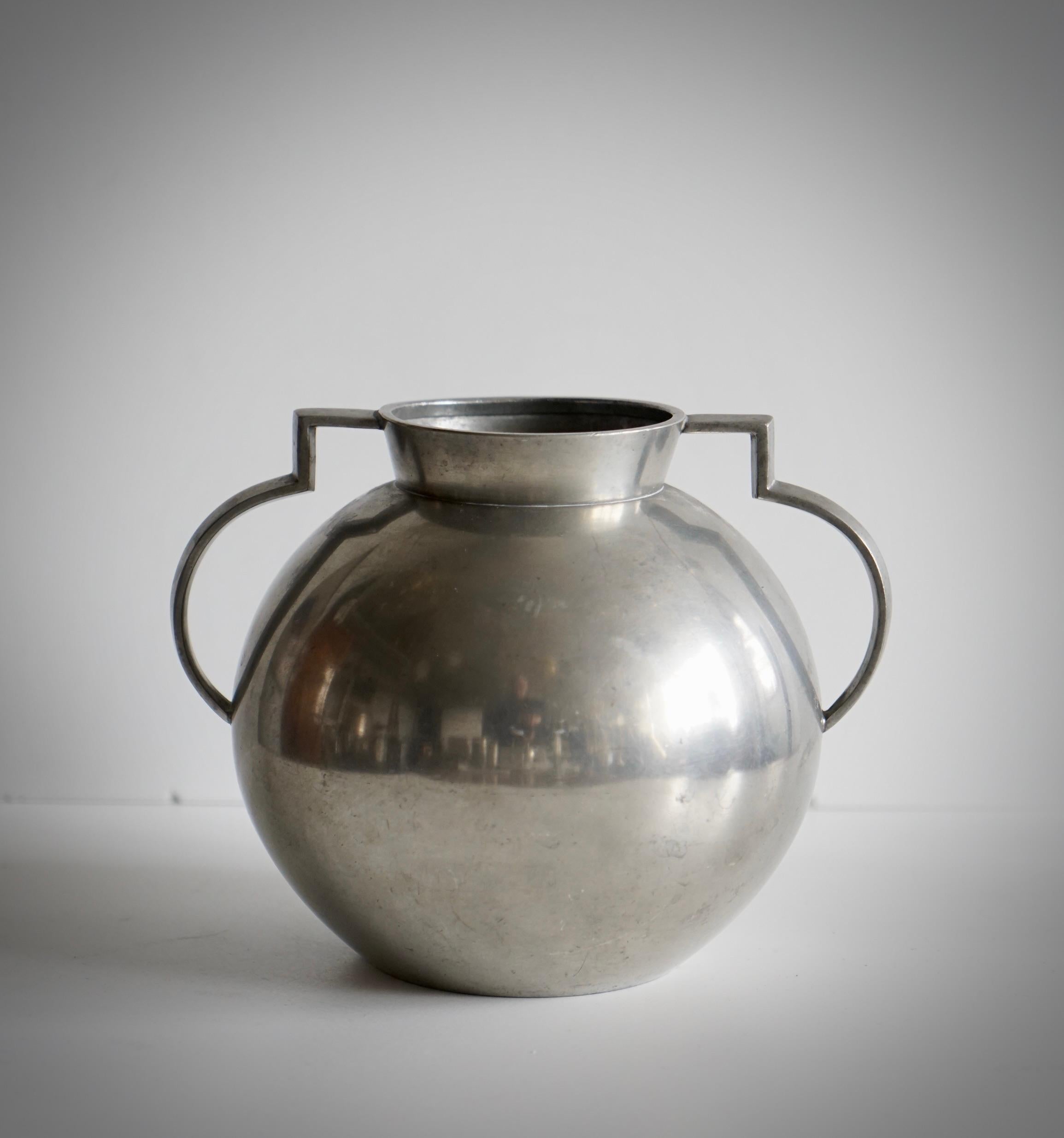 A pewter vase by  FOLKE ARSTRÖM for GAB, Sweden, circa 1930th. Limited edition of 150.
Stamped and numbered 57/150.