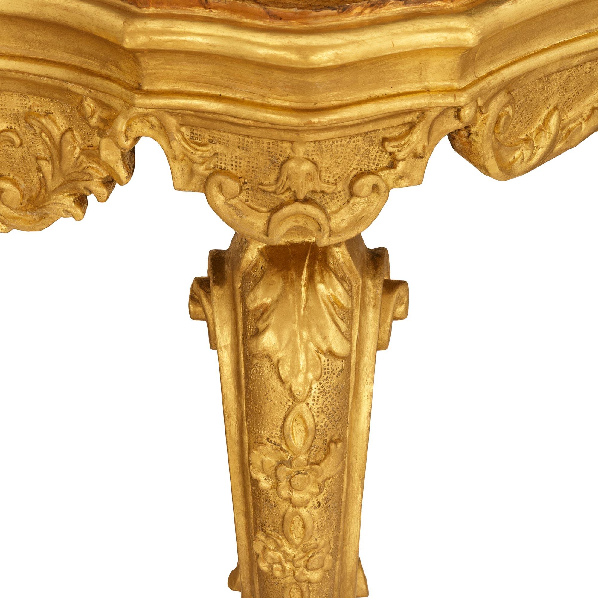 18th Century and Earlier A Venetian 18th century Giltwood and faux painted marble console For Sale