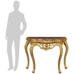 A Venetian 18th century Giltwood, Mecca and Fleur de Pêcher marble console