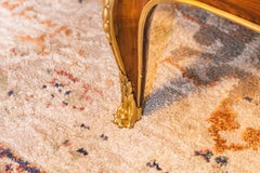 A very and rare 19th c French leather top book table with gilt bronze mounts