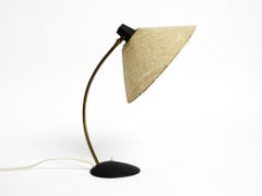 A very beautiful classic, large Mid Century table lamp with fiberglass shade