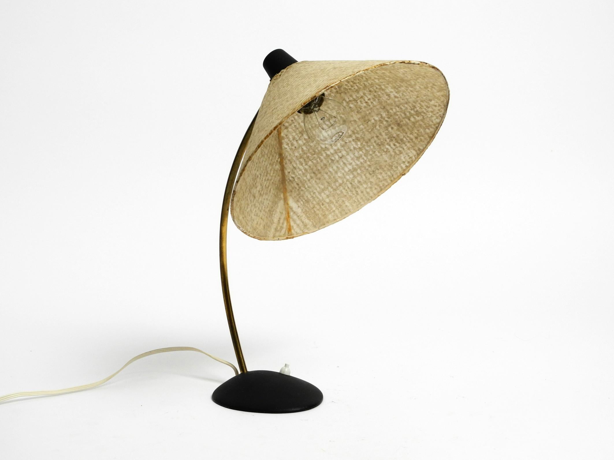 German A very beautiful classic, large Mid Century table lamp with fiberglass shade For Sale