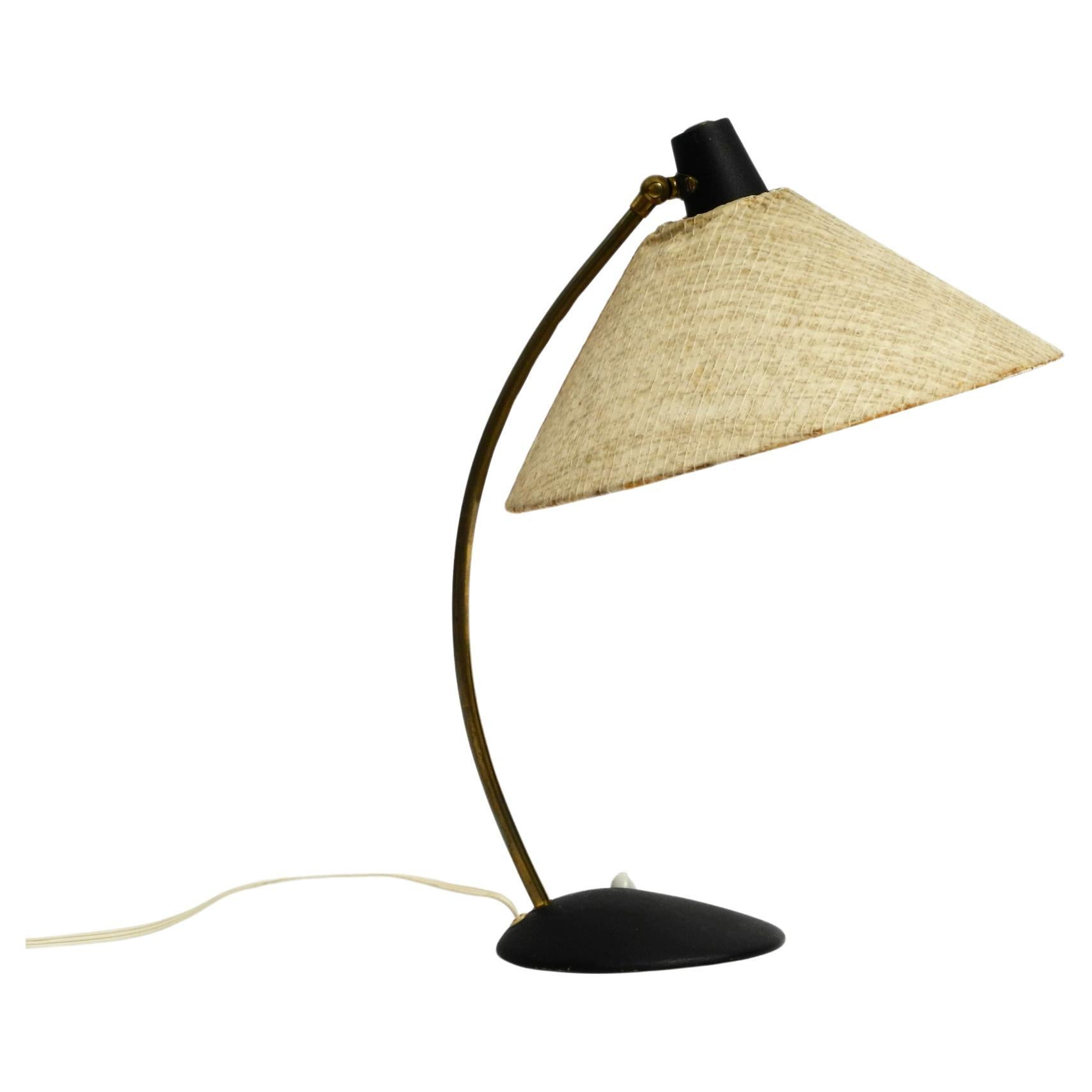 A very beautiful classic, large Mid Century table lamp with fiberglass shade For Sale