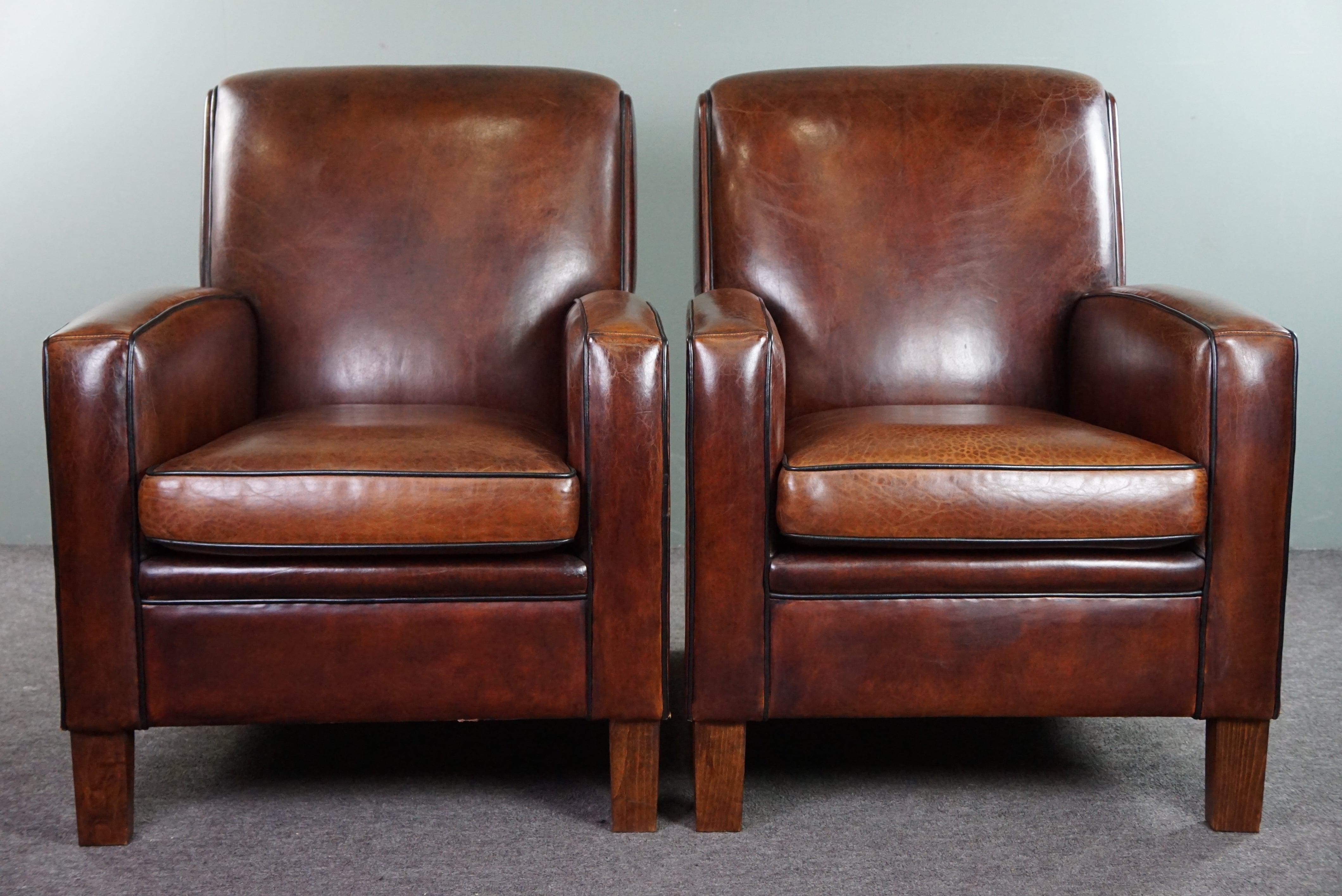 Hand-Crafted A very beautiful set of 2 Art Deco design armchairs in sheep leather For Sale