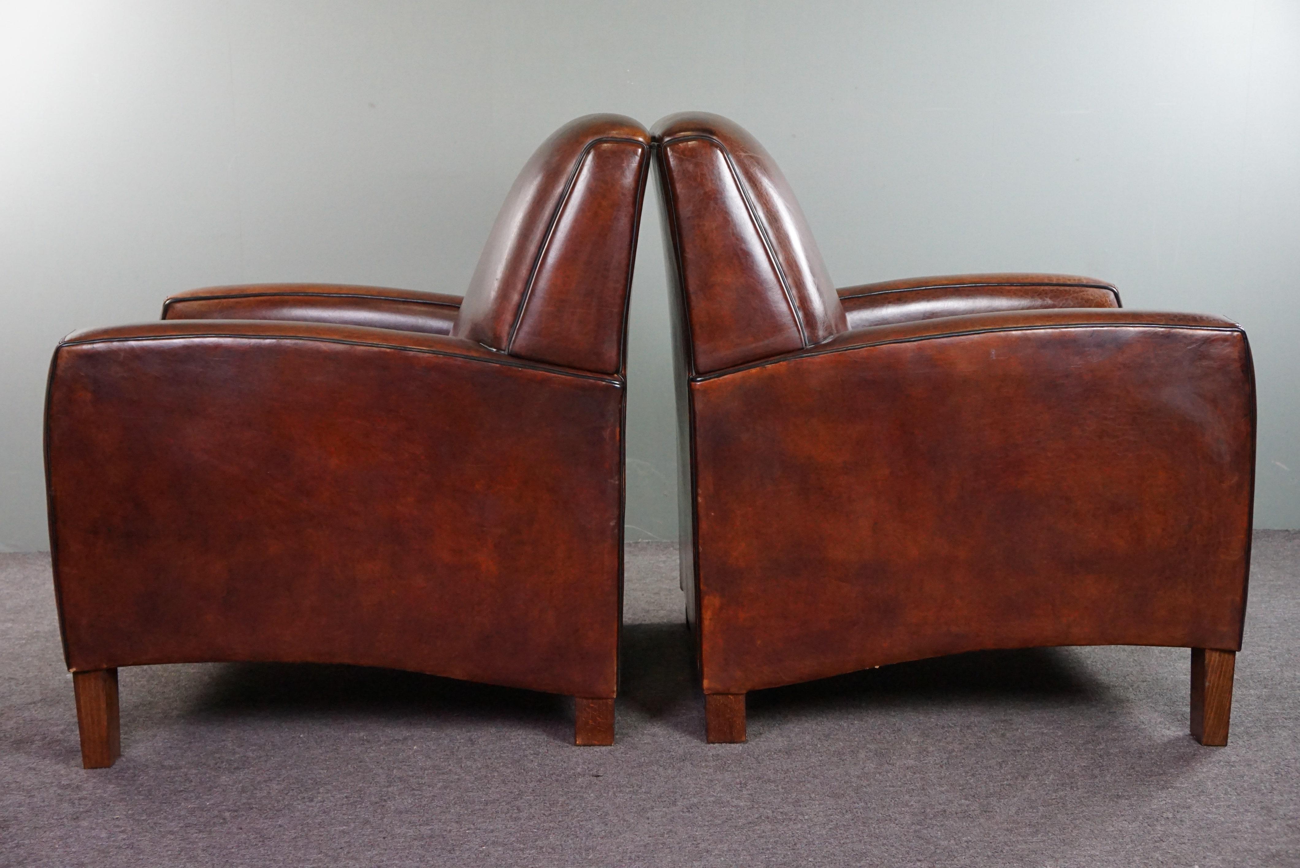 Leather A very beautiful set of 2 Art Deco design armchairs in sheep leather For Sale