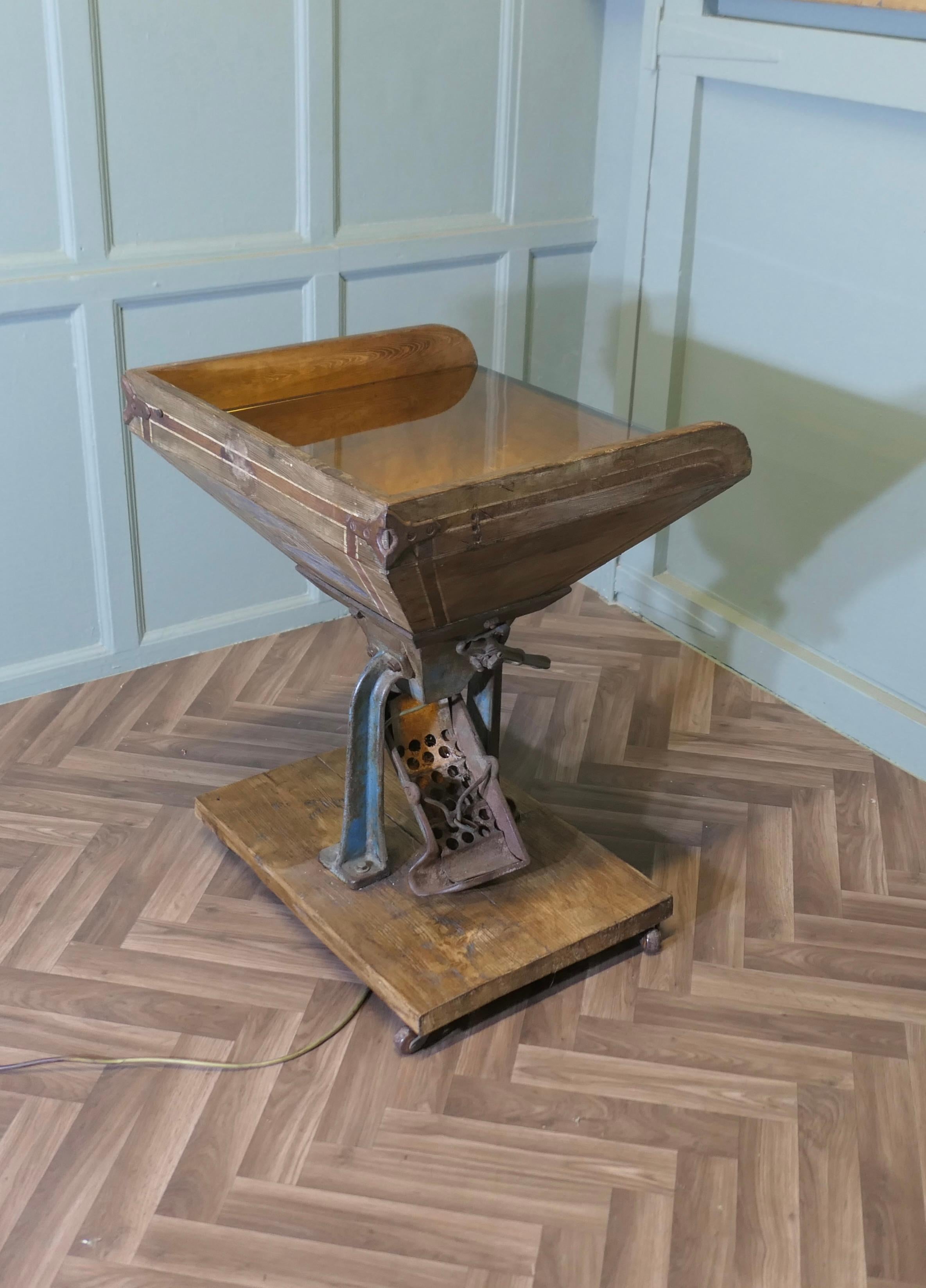 A Very Different Quirky Side or Lamp Table
This is an Agricultural/Industrial Piece, the Mill has been made from a Bamfords hand driven Corn Mill
The mill has a wooden casing enclosing the grinding mechanism, this has been wired as a light and has a