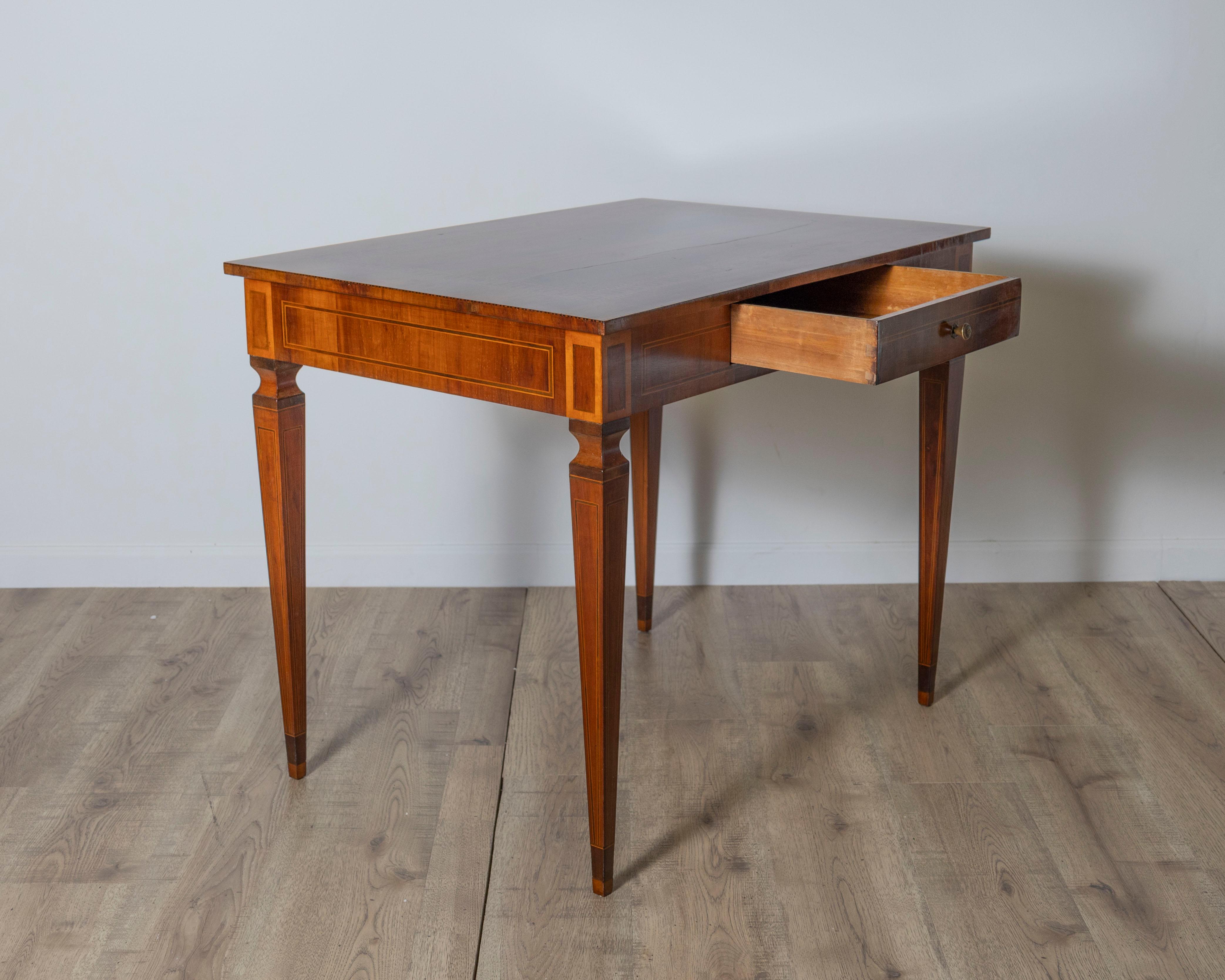 19th Century A very elegant walnut table/desk with a central drawer For Sale