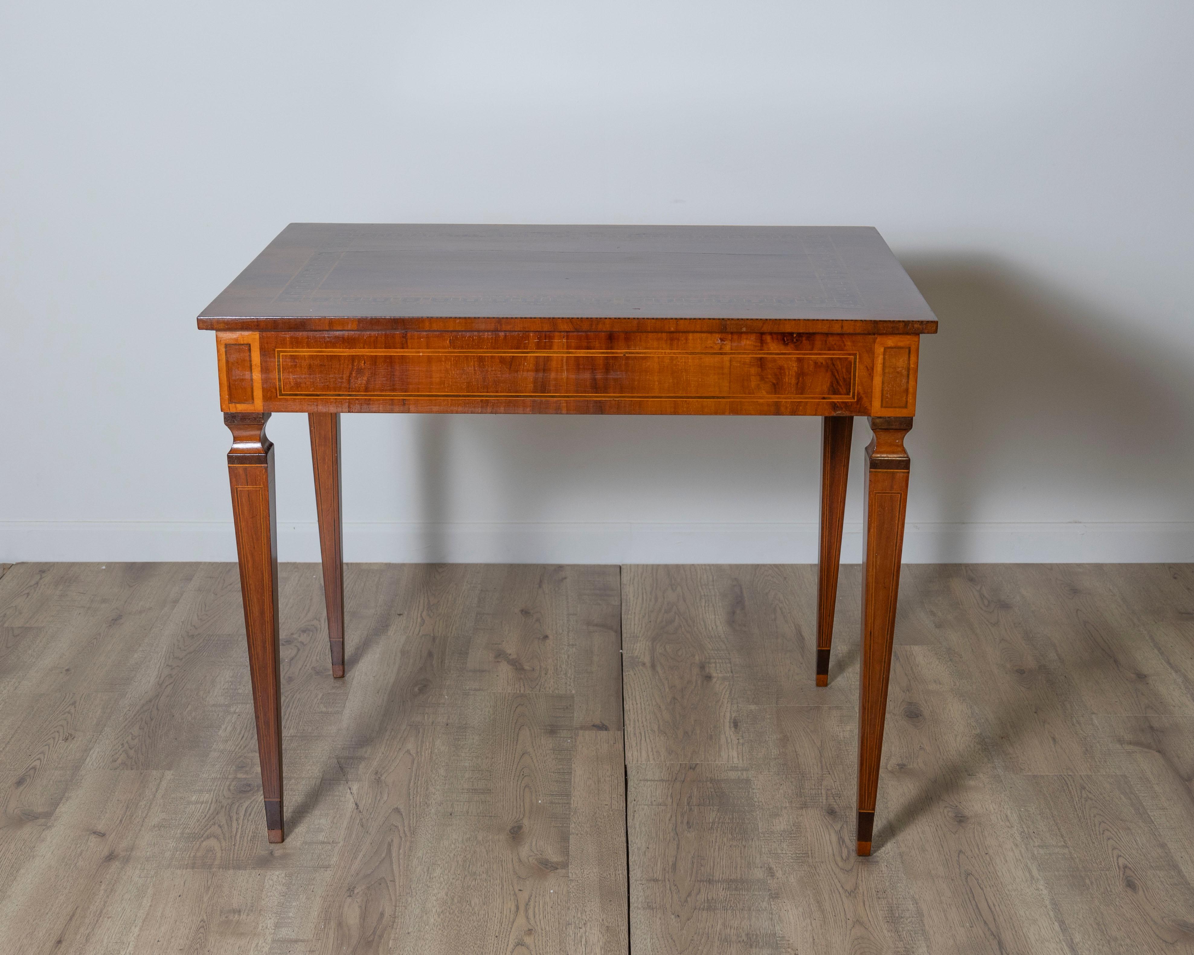 A very elegant walnut table/desk with a central drawer For Sale 1