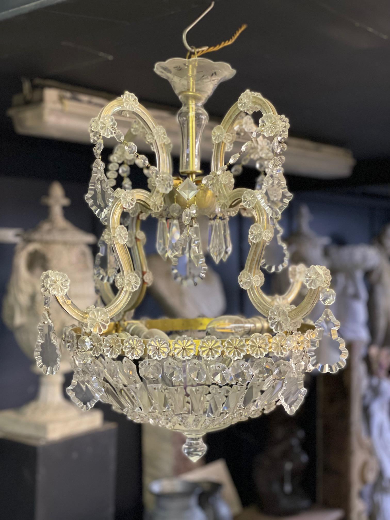 A very elegent pair of 20th century bag and tent style Marie Therese Chandeliers.

Can be sold seperately.

Removed from a private estate in Chingford Essex, United Kingdom.

