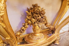 A very fine 19th c French Louis XVI water gilt console with a breccia marble top