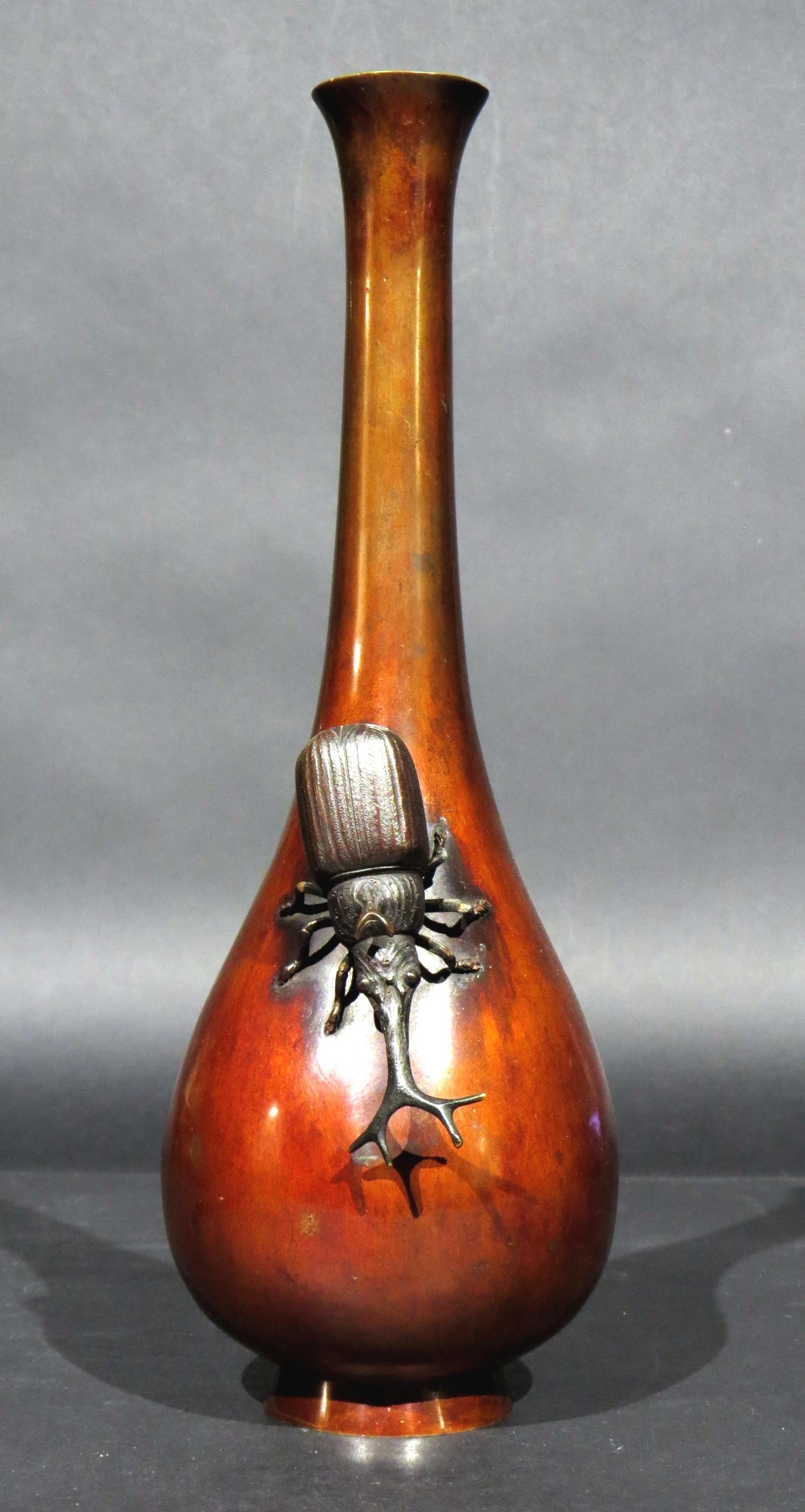 A fine & rare Meiji period 'Kabutomushi' bronze vase, exhibiting a fine old surface with an exceptionally fine patina overall, featuring an applied, naturalistically cast & detailed figure of a Rhinoceros beetle.
'Kabutomushi' is the Japanese term