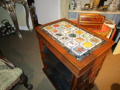 Un raffinato tavolo da libreria in legno di palissandro e marmo del XIX secolo Regency