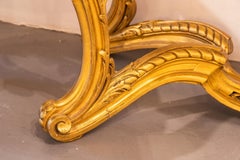 A very fine 19th century French Louis XVI carved and gilt marble top console