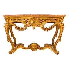 A very fine 19th century French Louis XVI carved and gilt marble top console