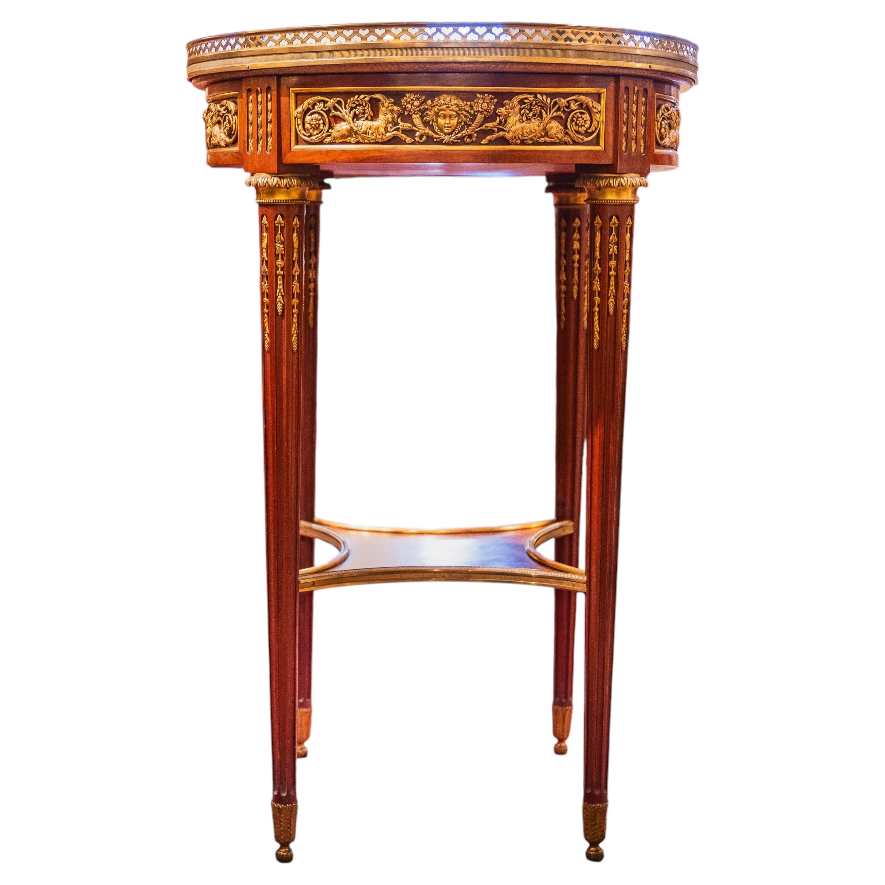 A very fine 19th century French Louis XVI gilt bronze mounted side table