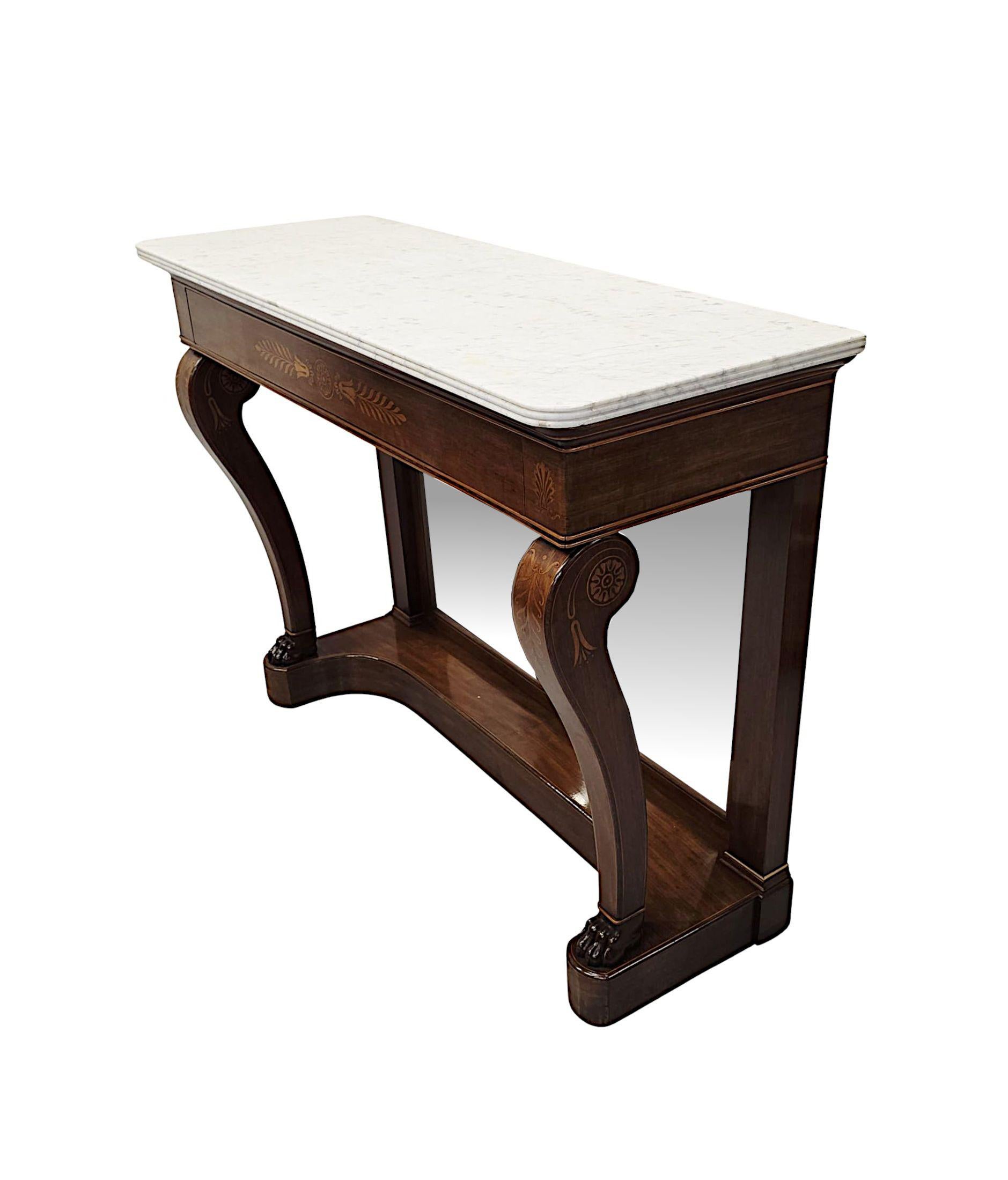 A very fine 19th Century well figured rosewood marble top console table, stunningly hand carved, of exceptional quality with beautifully rich patination, fine grain and with gorgeous marquetry inlaid detail throughout.  The striking moulded Carrara