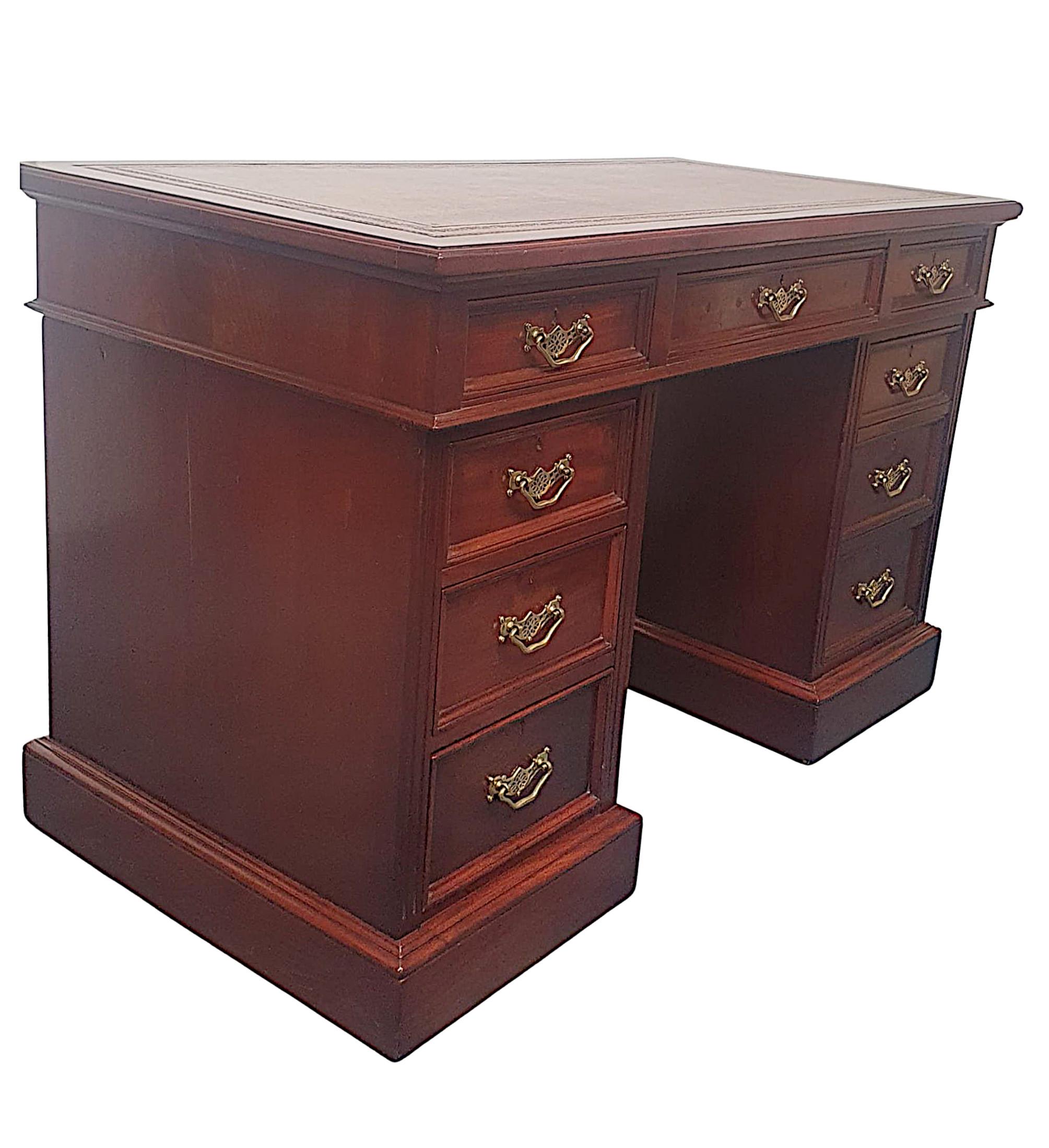 A very fine 19th Century mahogany nine drawer pedestal desk by James Shoolbred of London, the moulded top inset with gilt embossed brown tooled leather writing skiver surface raised over frieze with one long cockbeaded drawer flanked with two short