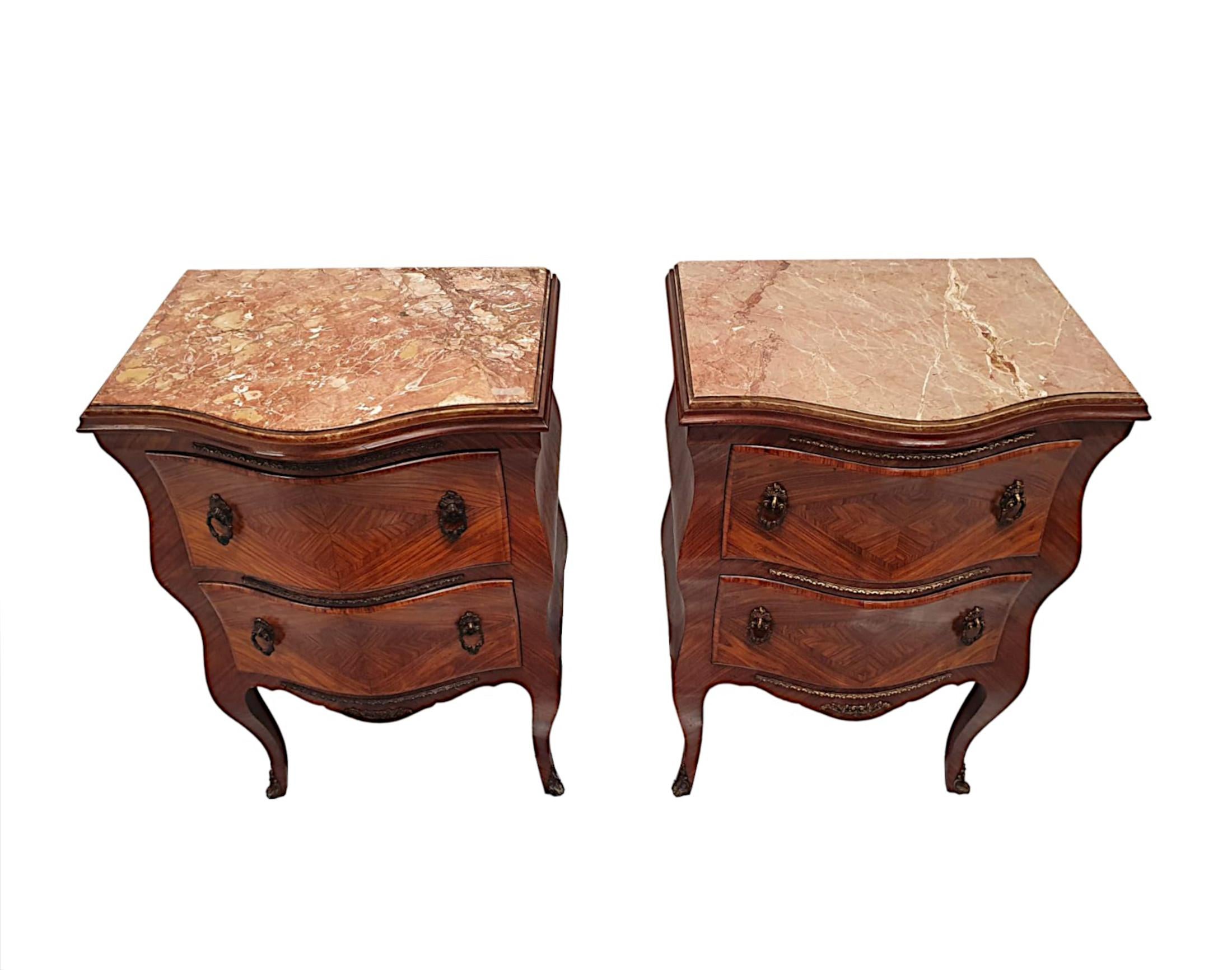 A very fine 19th Century pair of marble top kingwood chests of grand proportions, fabulously hand carved and ormolu mounted throughout with gorgeously rich patination and grain. The gorgeous moulded, serpentine Rosso Levante marble top of