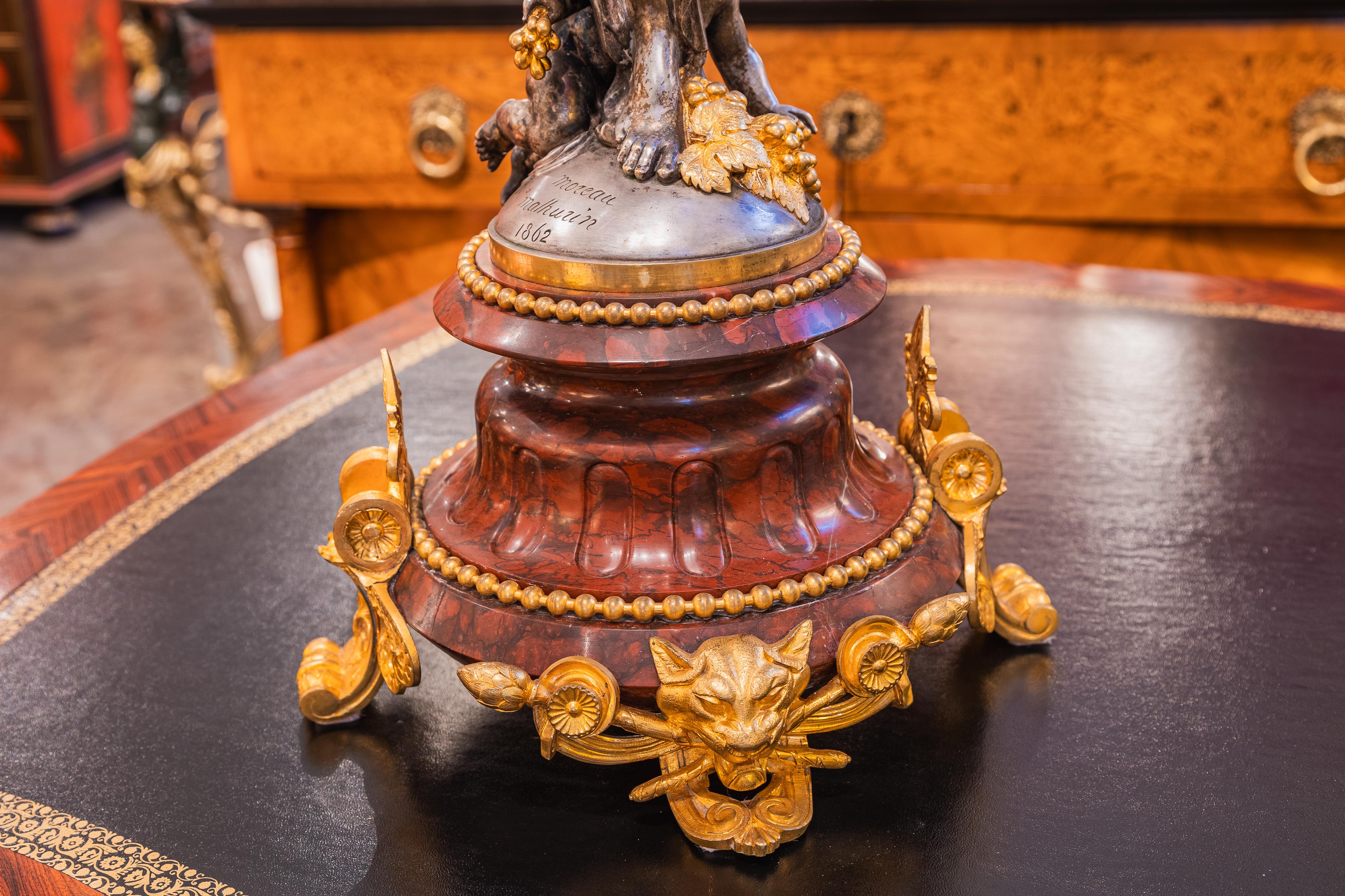 A very fine 19th century French slivered bronze and gilt bronze centerpiece by Mathurin Moreau . Dated 1862 . Moreau is considered one of the finest sculptors in France in the 19th century . The crystal top is in perfect condition . 13''diameter on