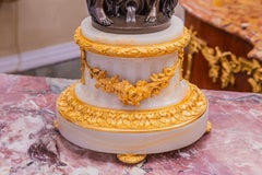 A very fine and large pair of 19th c French bronze and alabaster figural lamps