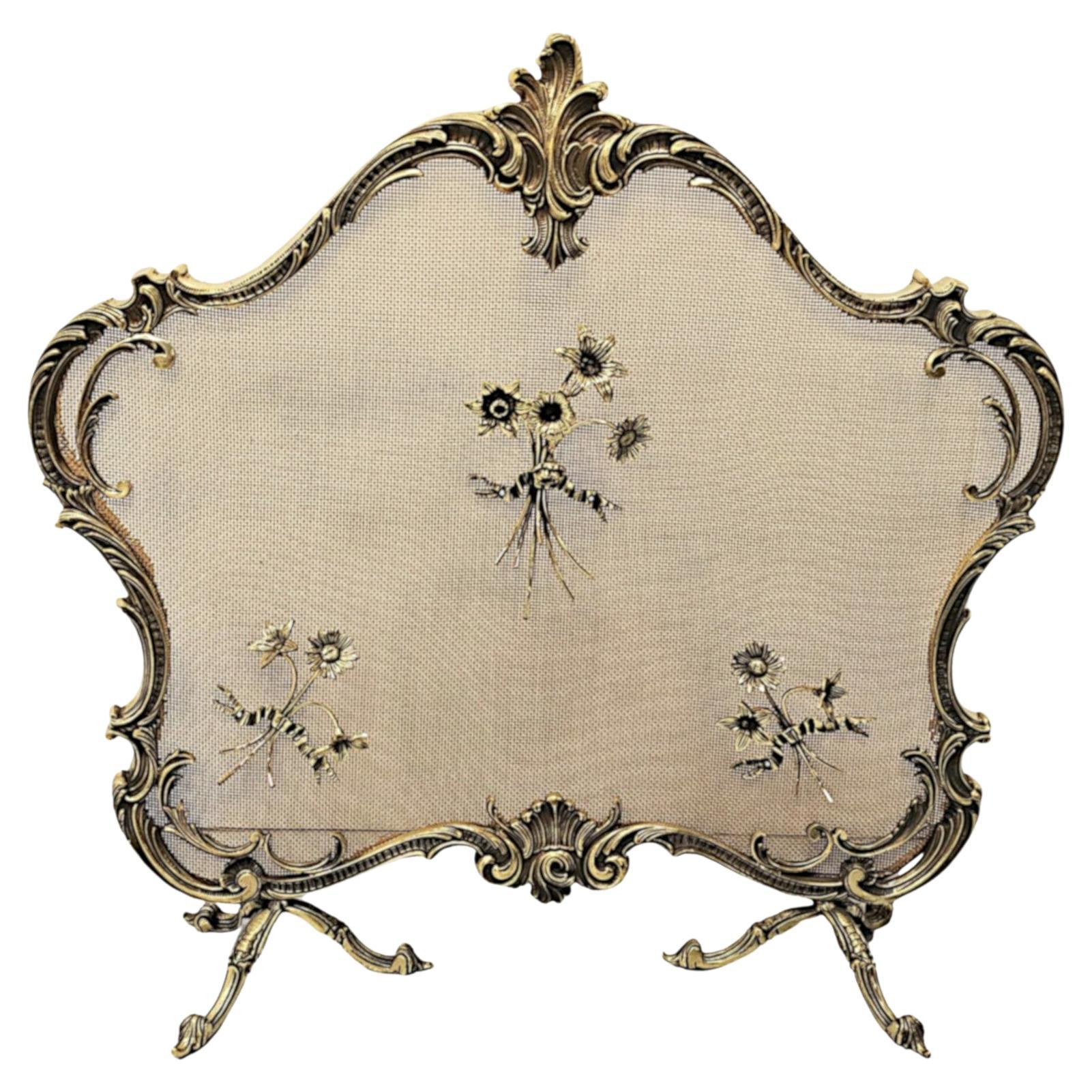 Un parafuoco in ottone molto bello e insolito del XIX secolo