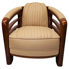 A Very Fine Art Deco Design Leather and Cherrywood Armchair